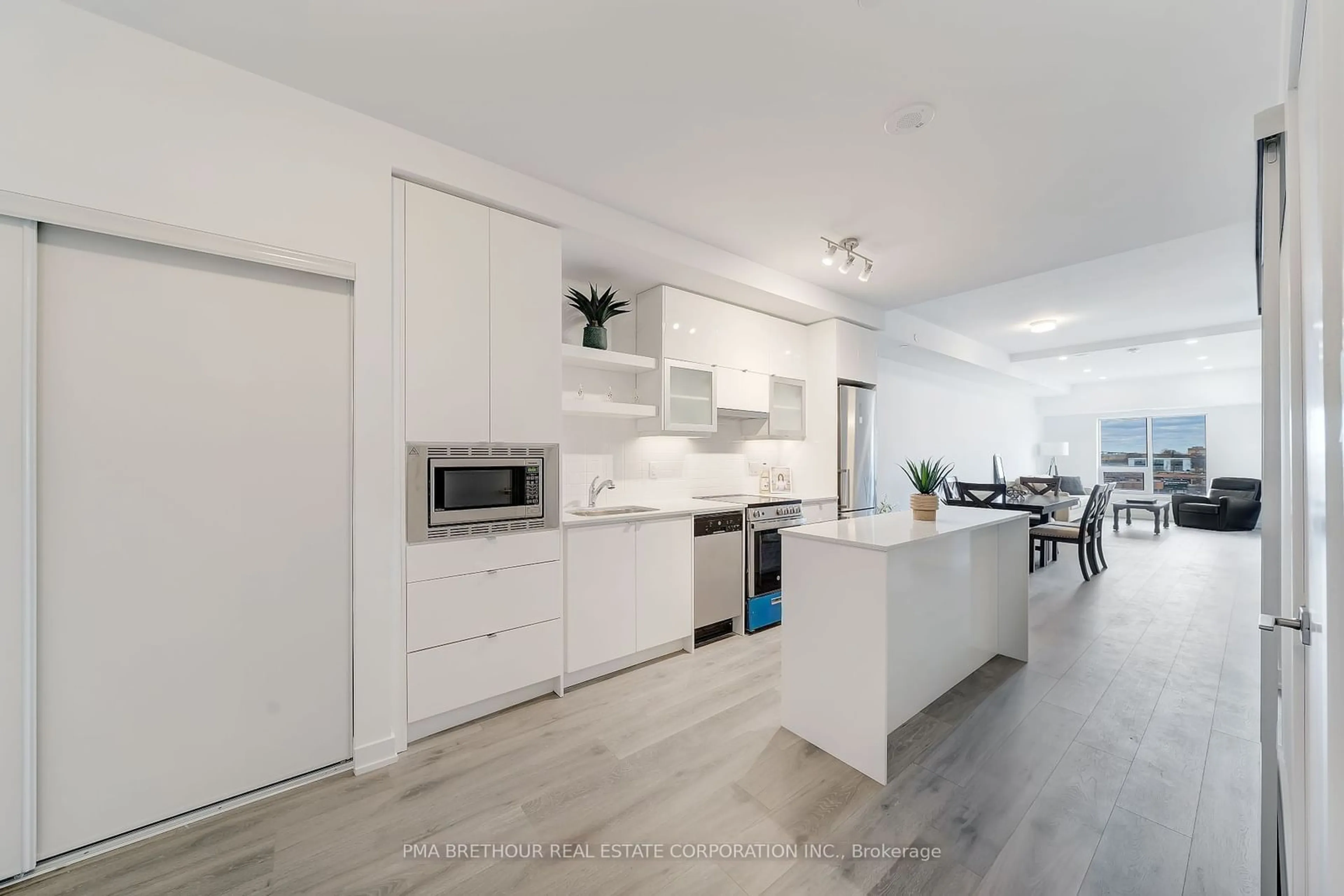 Open concept kitchen, unknown for 2433 Dufferin St #811, Toronto Ontario M6E 0B4