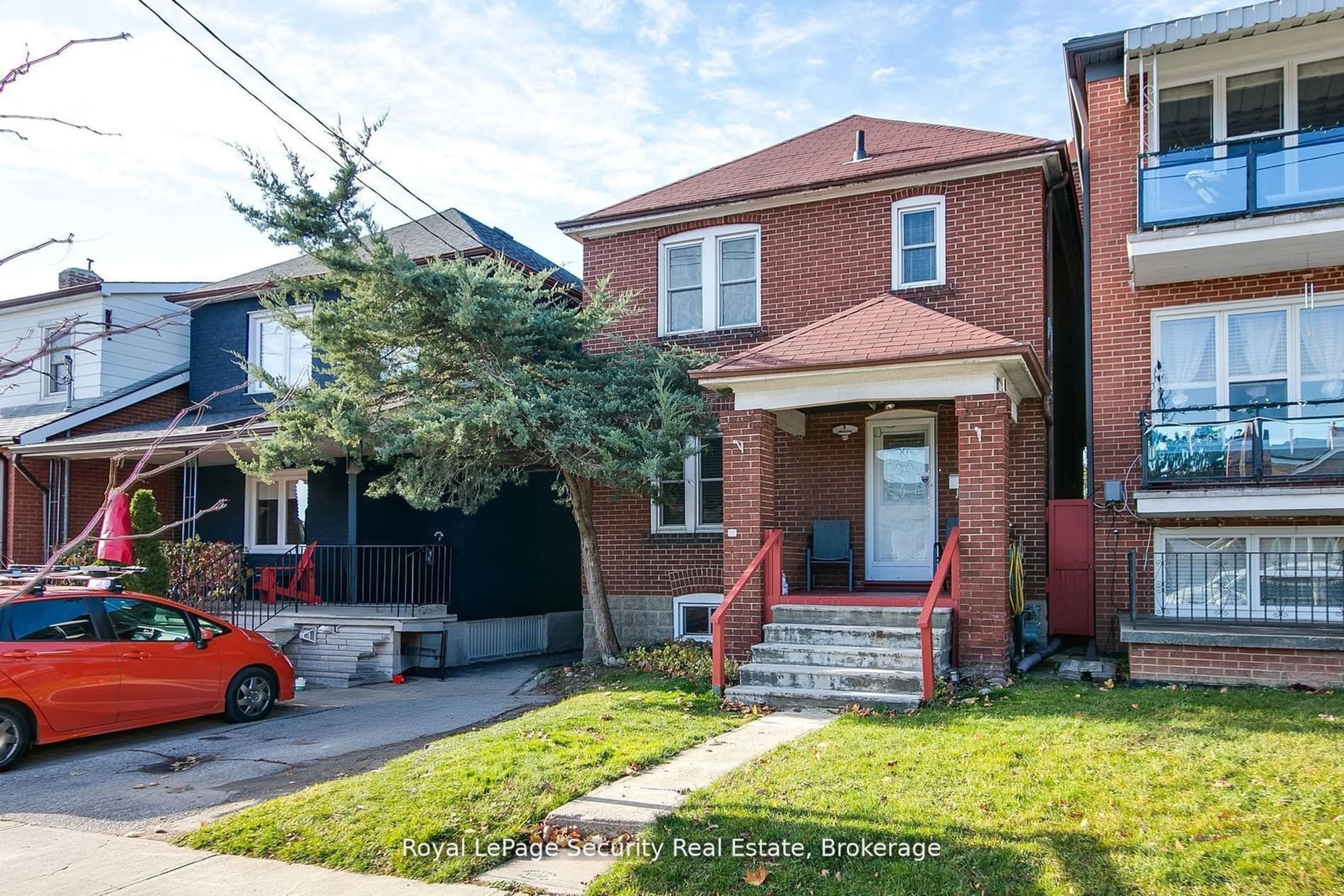 Home with brick exterior material, street for 94 Fairbank Ave, Toronto Ontario M6E 3Y7