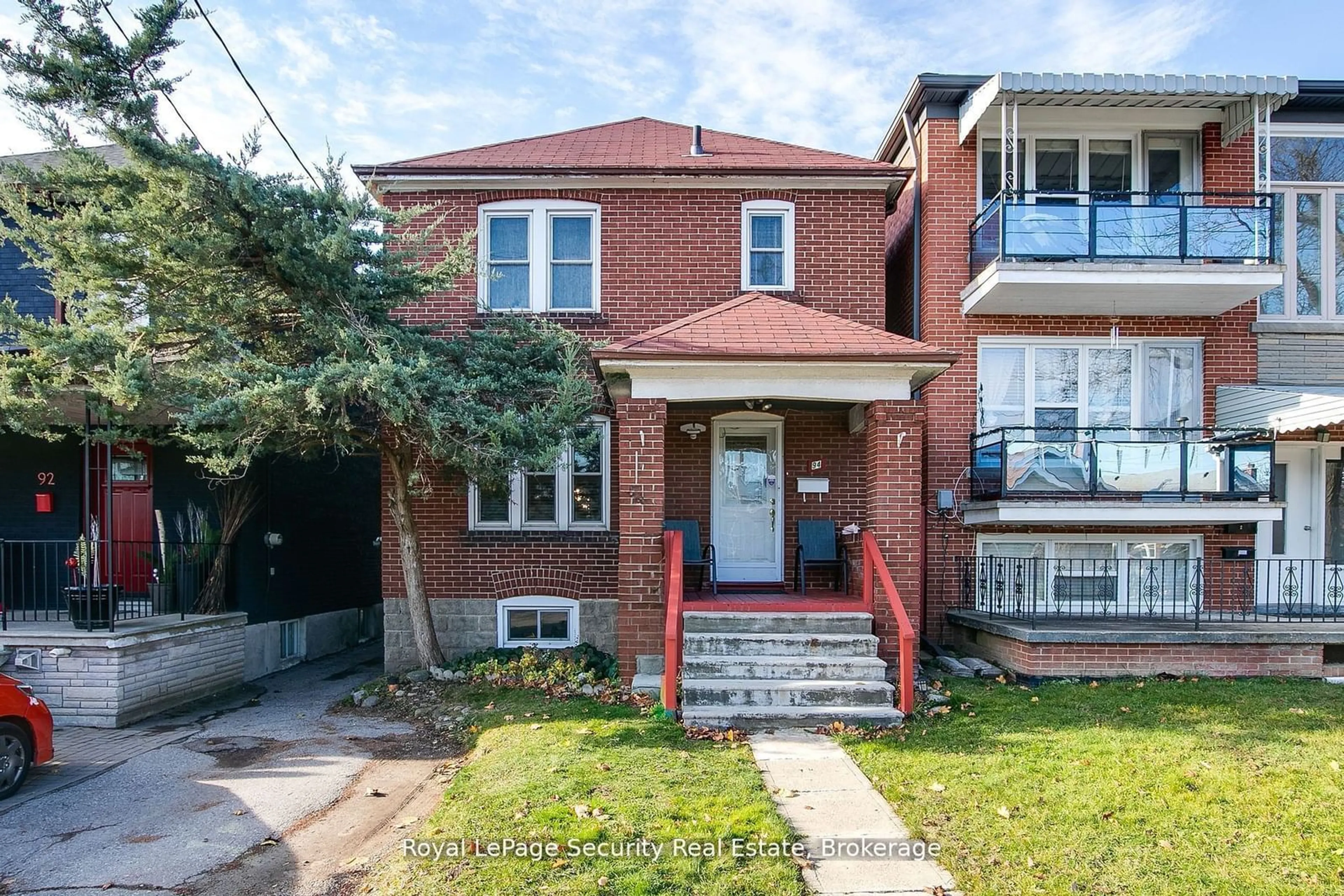 Home with brick exterior material, street for 94 Fairbank Ave, Toronto Ontario M6E 3Y7