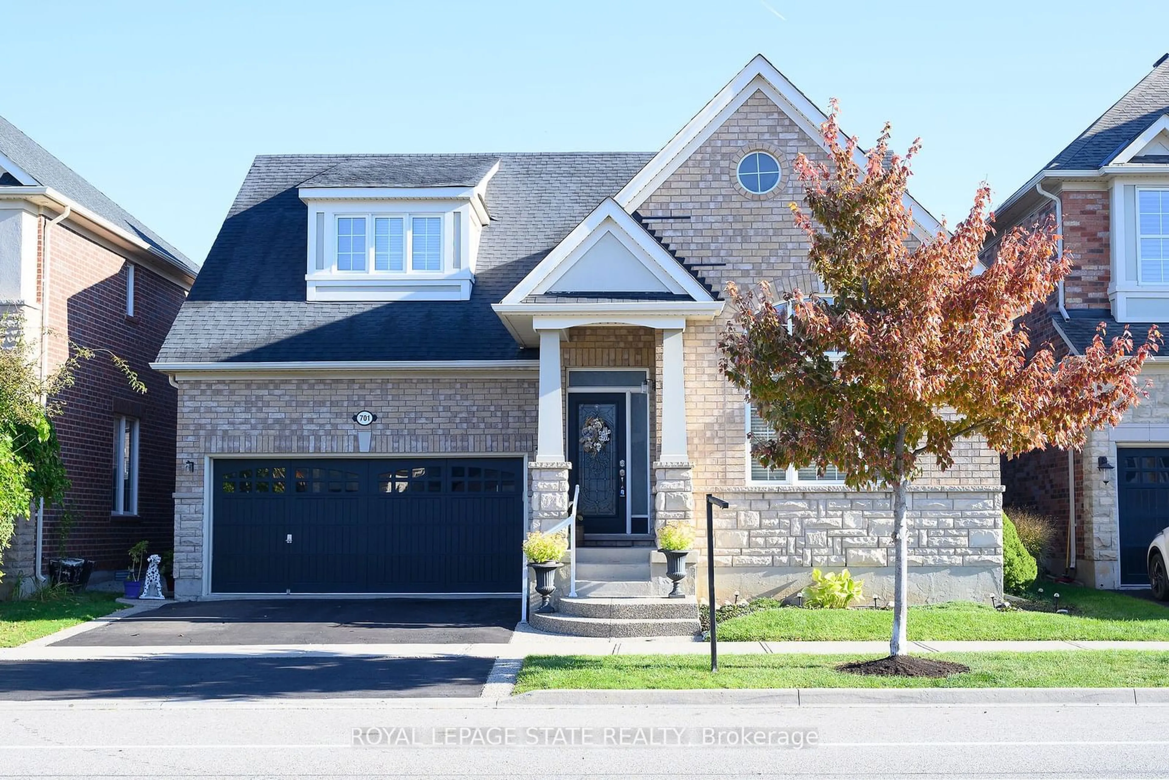 Home with brick exterior material, street for 701 Savoline Blvd, Milton Ontario L8T 0N2