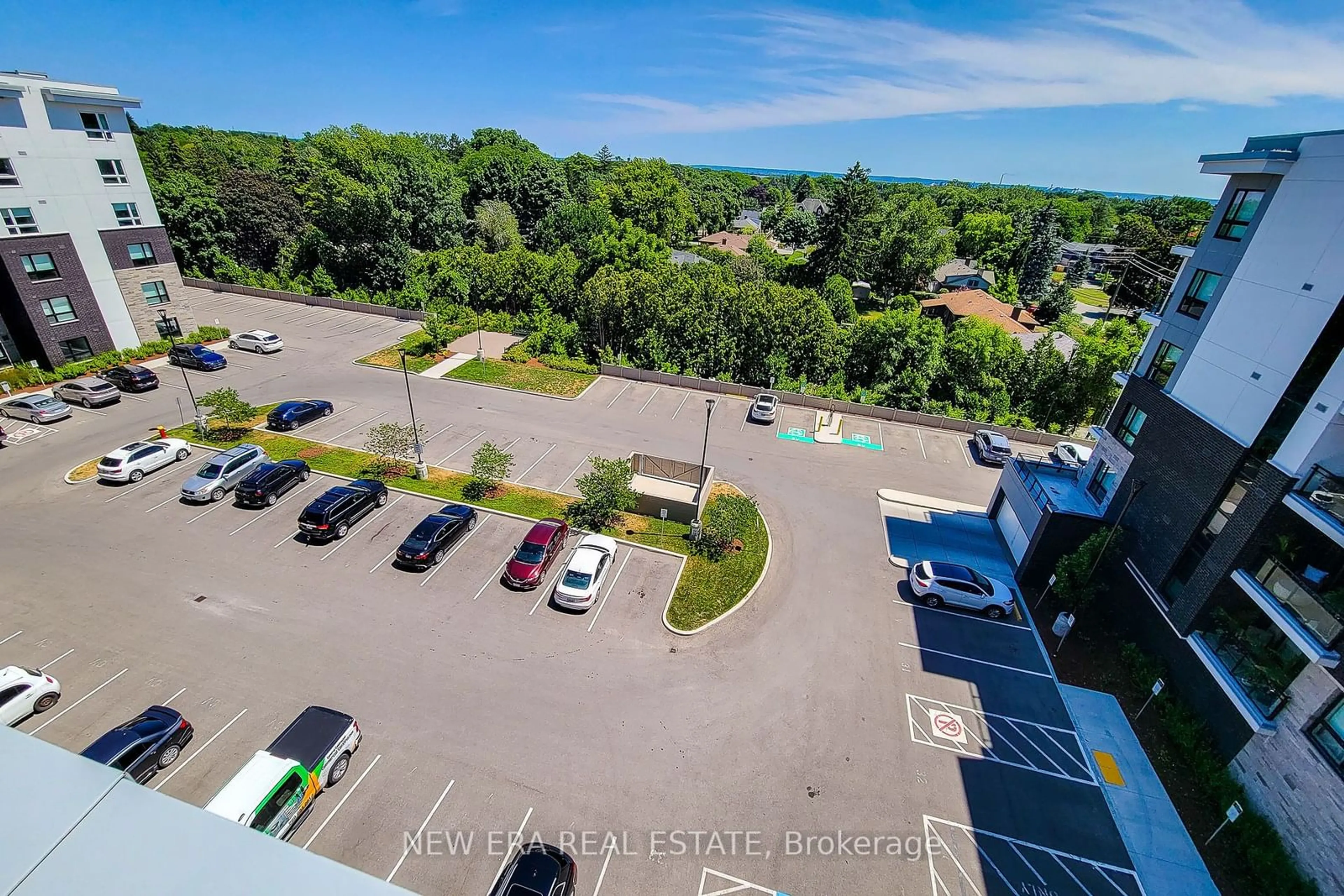 A pic from outside/outdoor area/front of a property/back of a property/a pic from drone, unknown for 320 Plains Rd #212, Burlington Ontario L7T 2C8