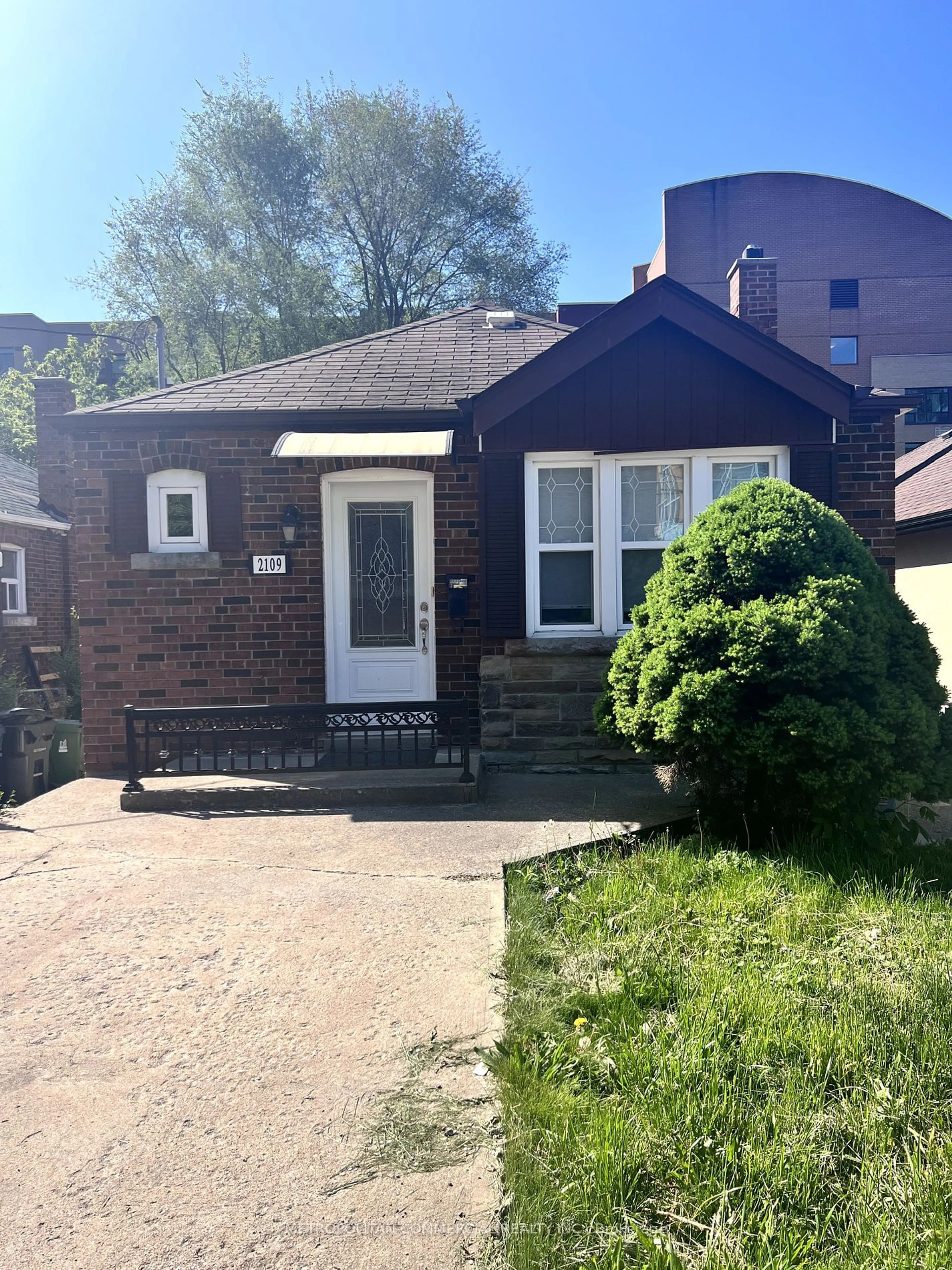 Home with brick exterior material, street for 2109 Lawrence Ave, Toronto Ontario M9N 1H7