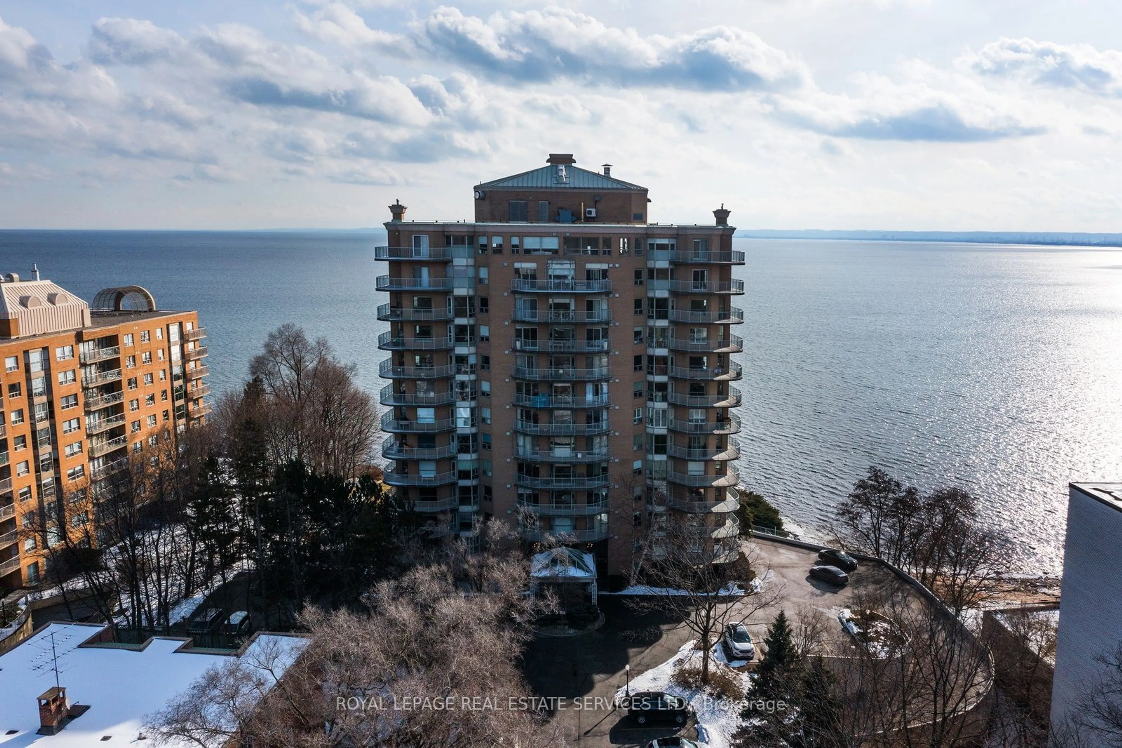 A pic from outside/outdoor area/front of a property/back of a property/a pic from drone, water/lake/river/ocean view for 2190 Lakeshore Rd #PH11C, Burlington Ontario L7R 4K1