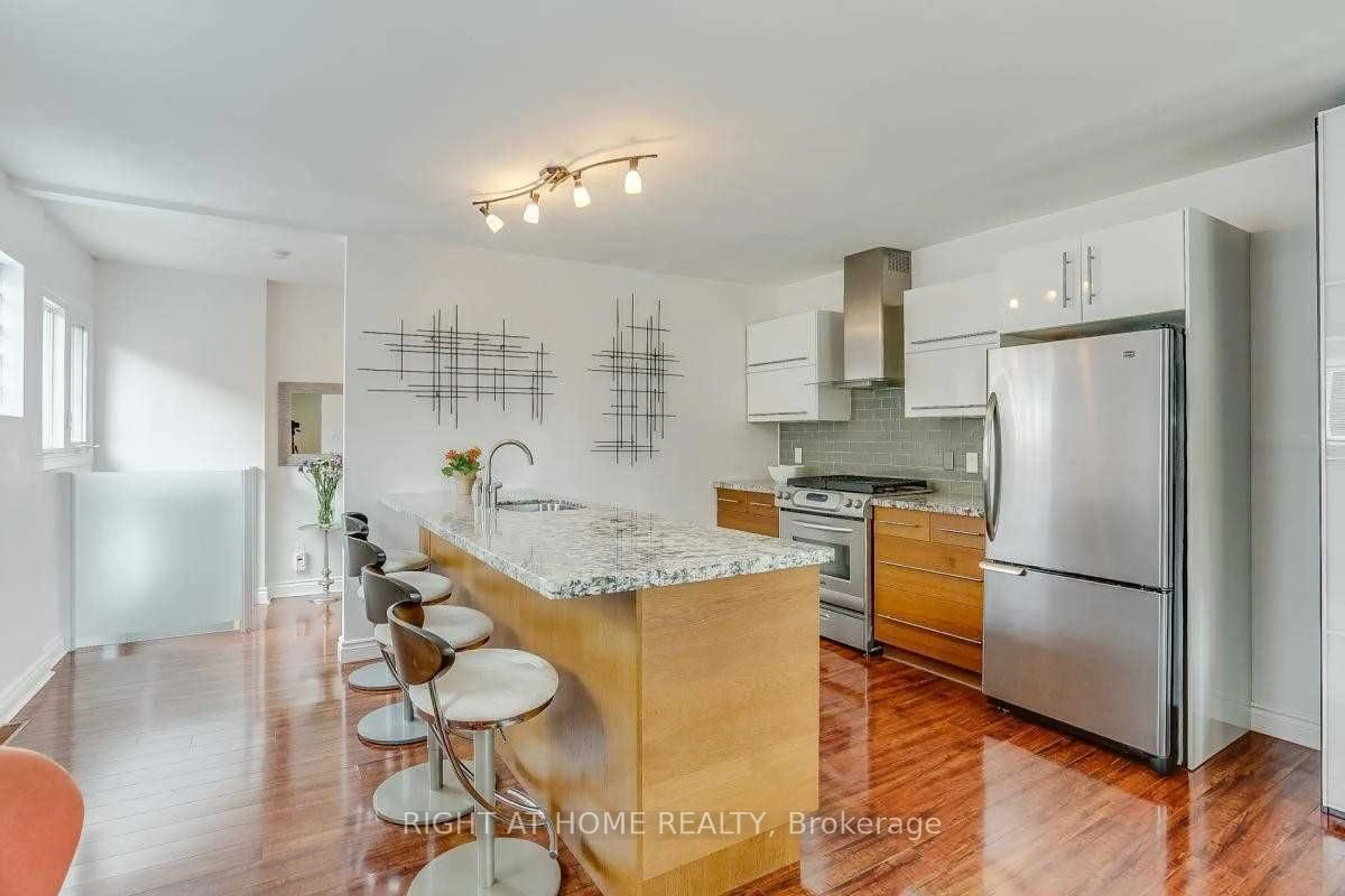 Open concept kitchen, unknown for 134 Locksley Ave, Toronto Ontario M6B 3N5