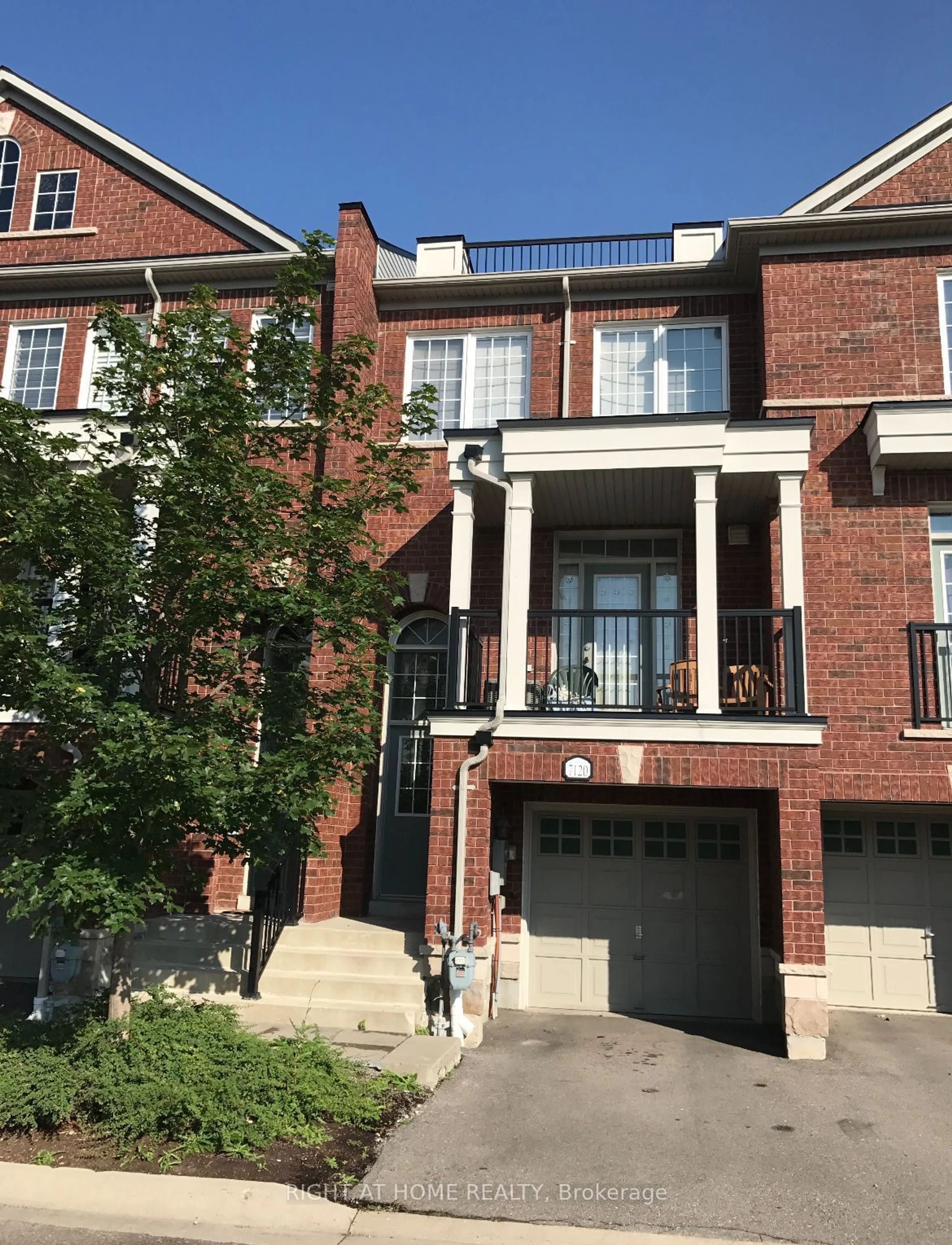 Home with brick exterior material, street for 7120 Triumph Lane, Mississauga Ontario L5N 0C5