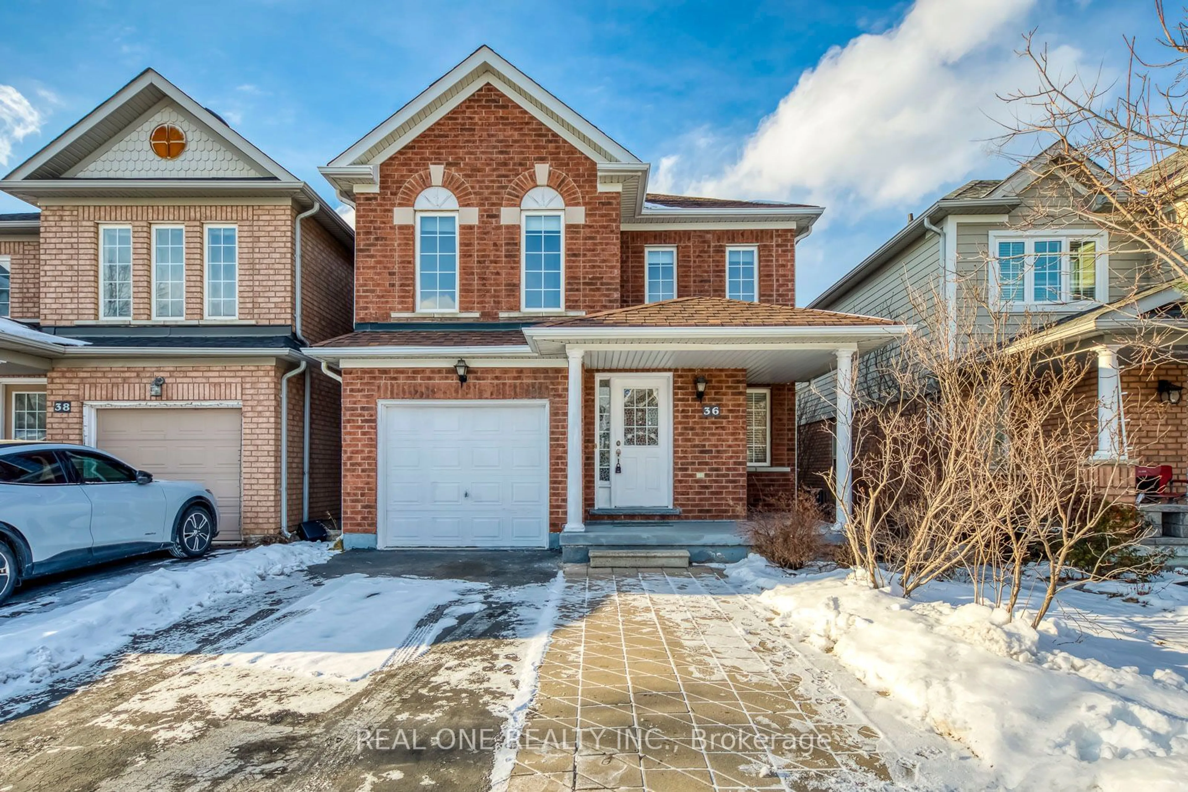 Home with brick exterior material, street for 36 Tideland Dr, Brampton Ontario L7A 2W2