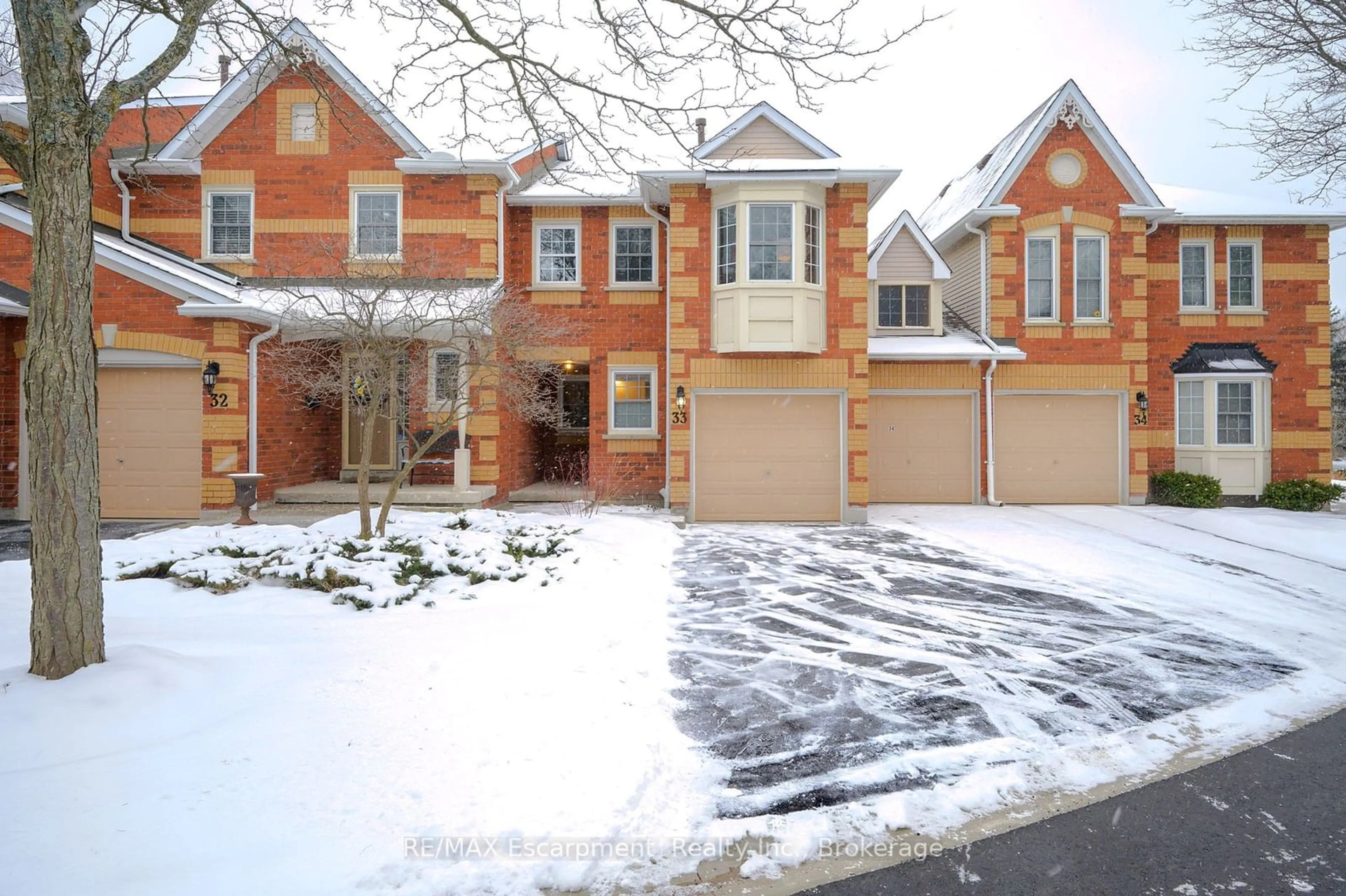 Home with brick exterior material, street for 1415 Hazelton Blvd #33, Burlington Ontario L7P 4W6