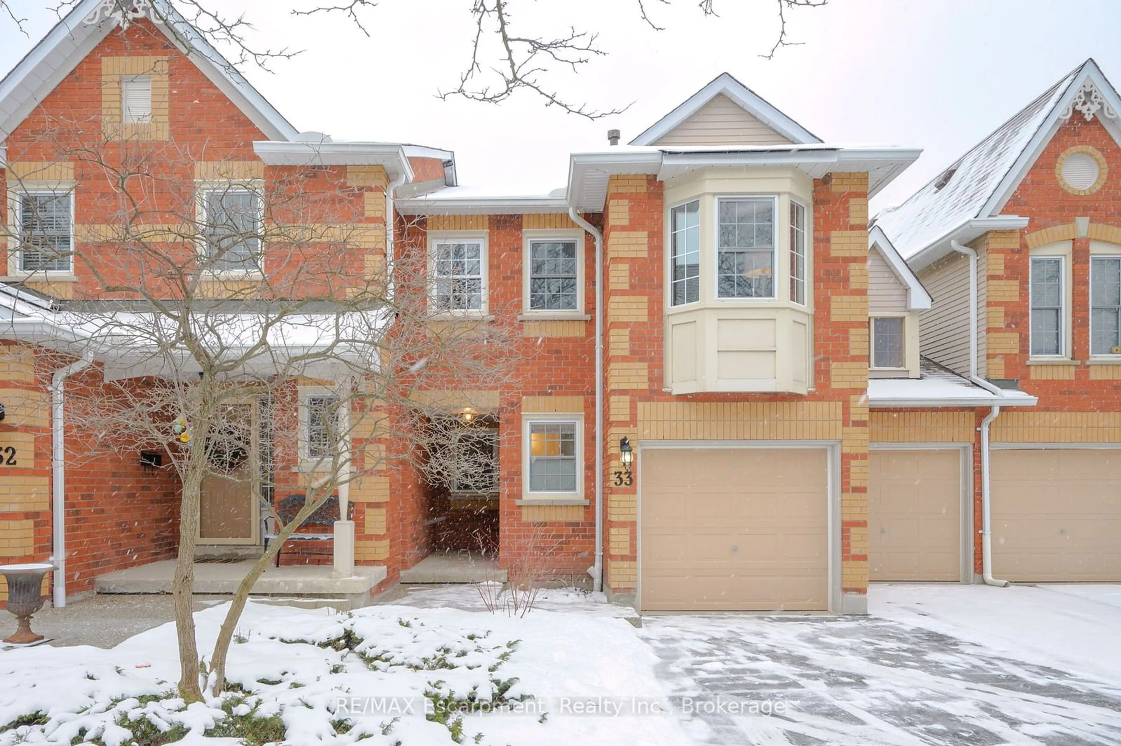 Home with brick exterior material, street for 1415 Hazelton Blvd #33, Burlington Ontario L7P 4W6