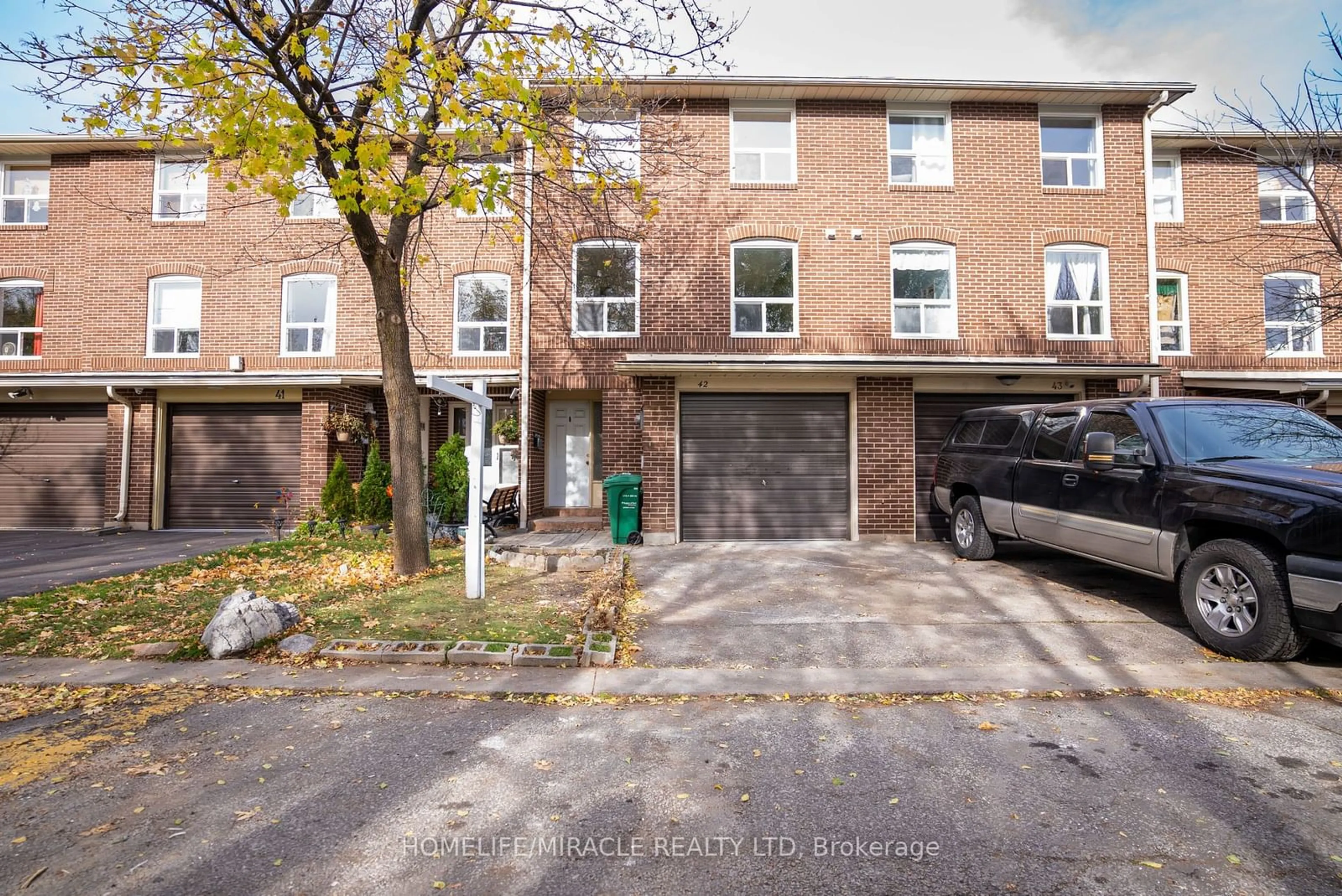 Home with brick exterior material, street for 42 Eden Park Dr, Brampton Ontario L6T 3A5