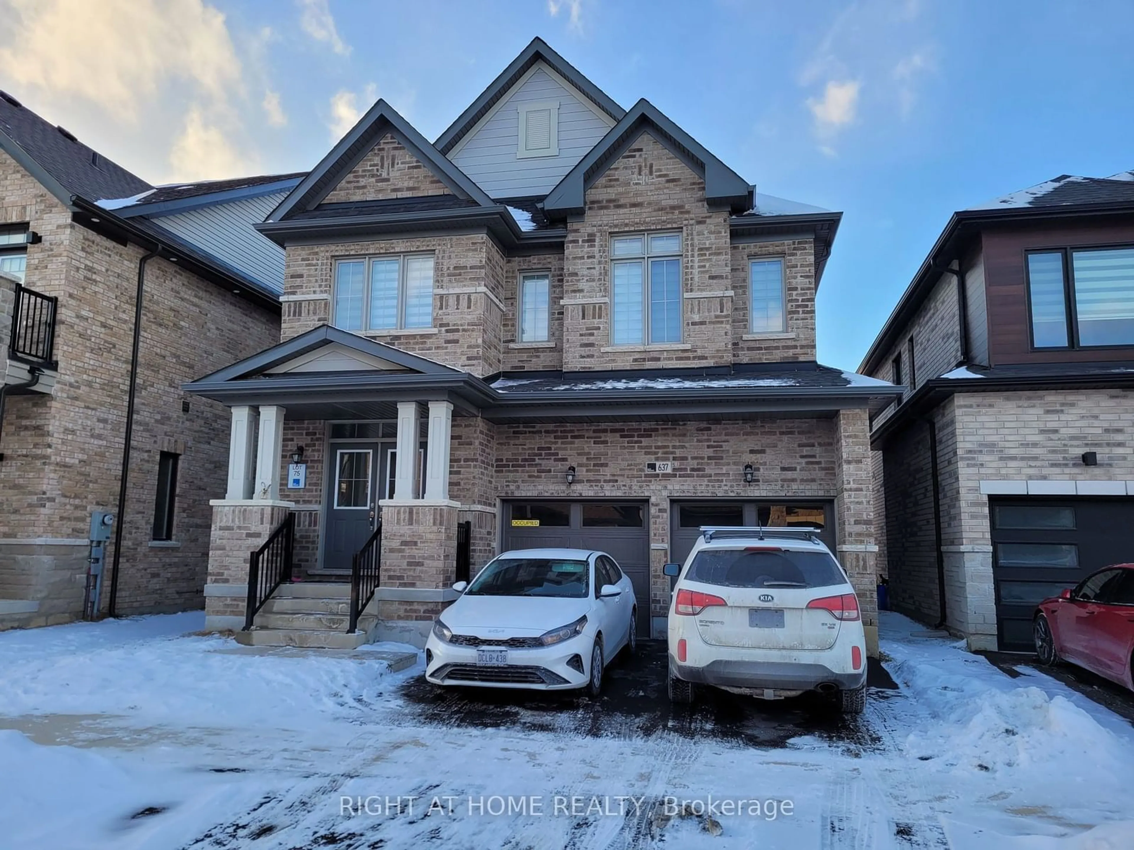 Home with brick exterior material, street for 637 Leatherleaf Lane, Milton Ontario L9V 1E3