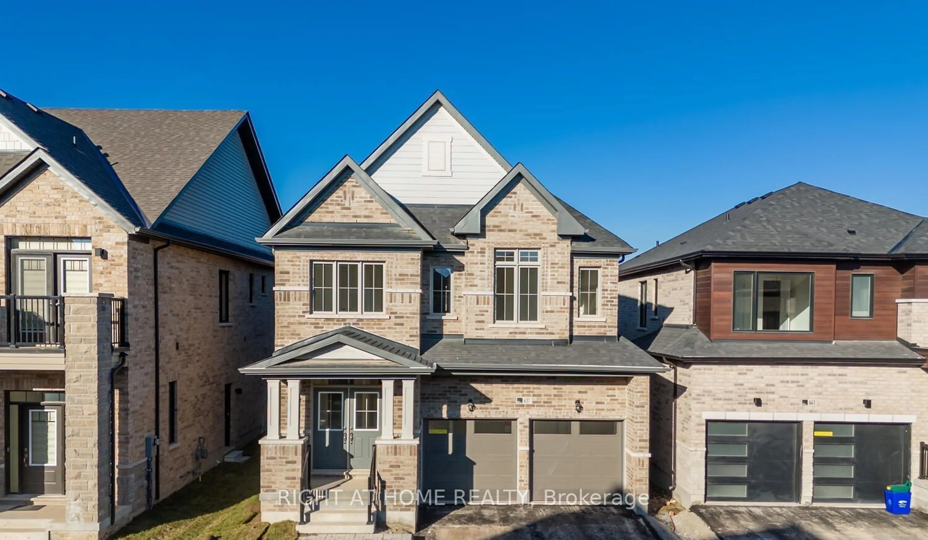 Home with brick exterior material, street for 637 Leatherleaf Lane, Milton Ontario L9V 1E3