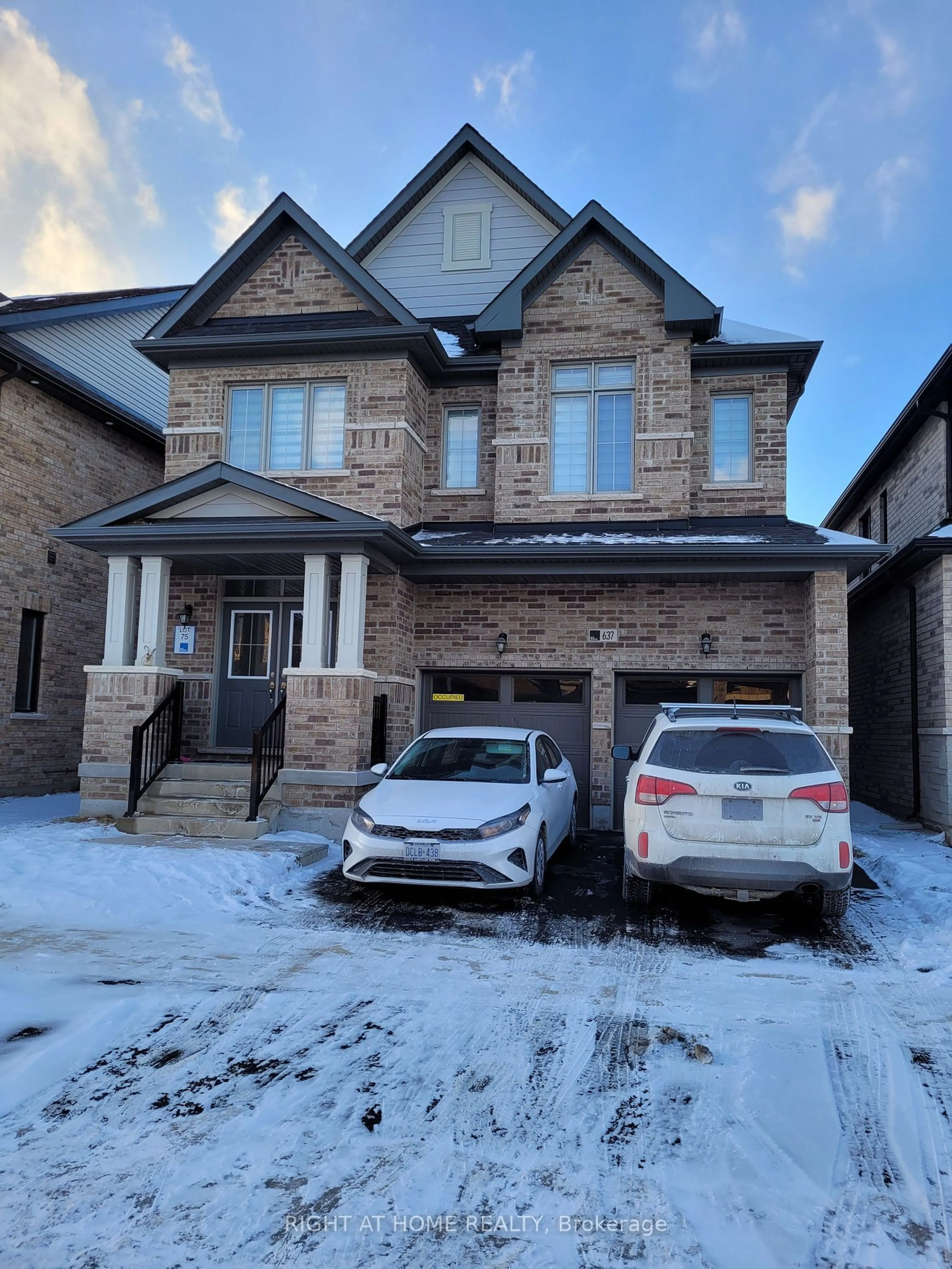 Home with brick exterior material, street for 637 Leatherleaf Lane, Milton Ontario L9V 1E3