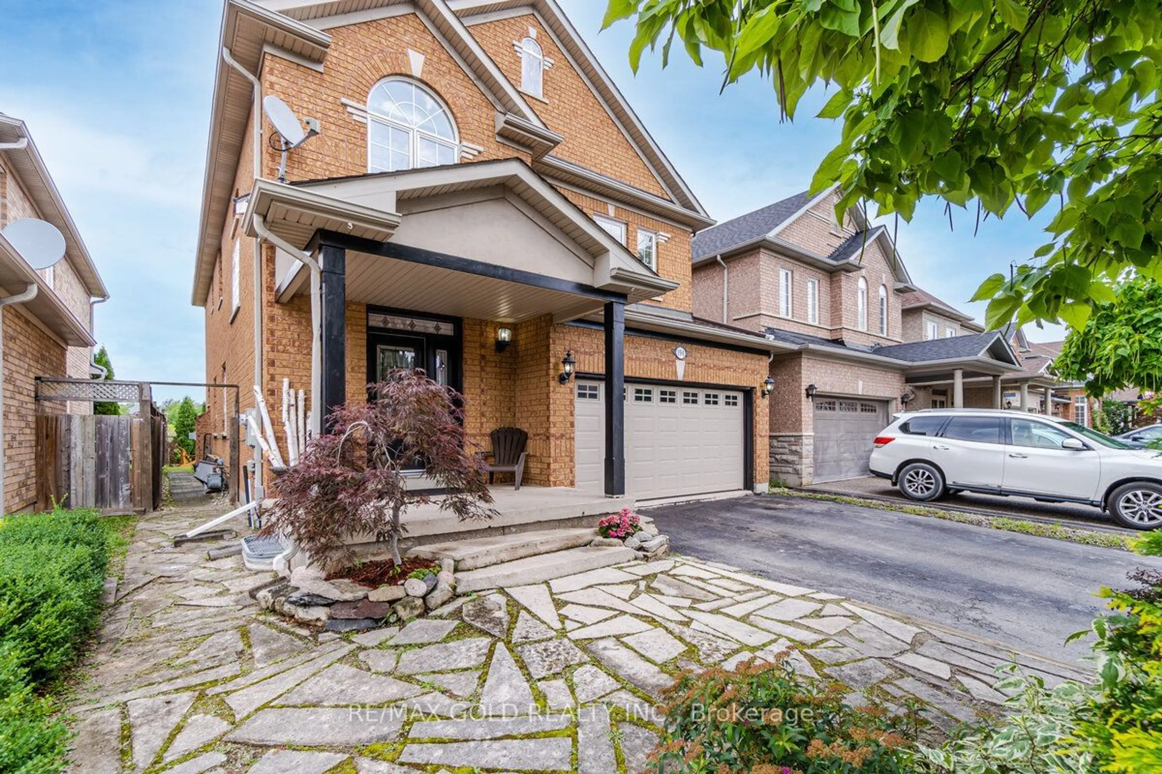 Home with brick exterior material, street for 194 Manley Lane, Milton Ontario L9T 5N8