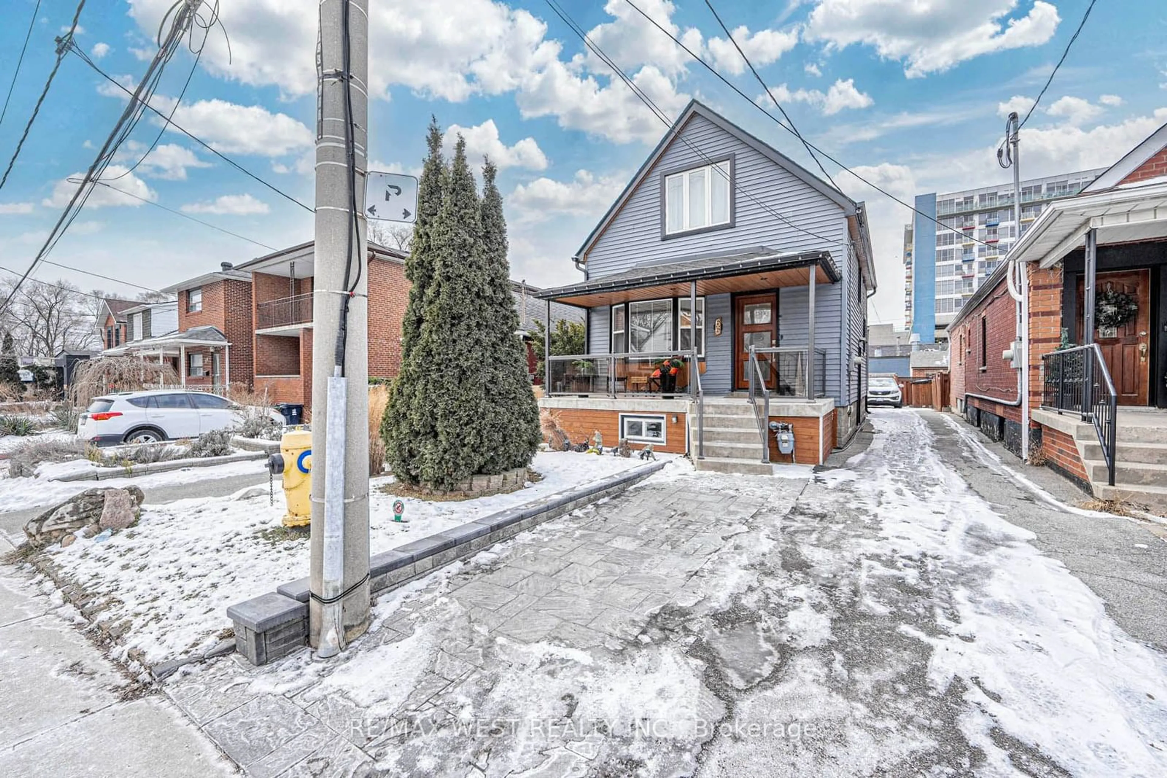 Home with brick exterior material, street for 66 Regent St, Toronto Ontario M6N 3N9