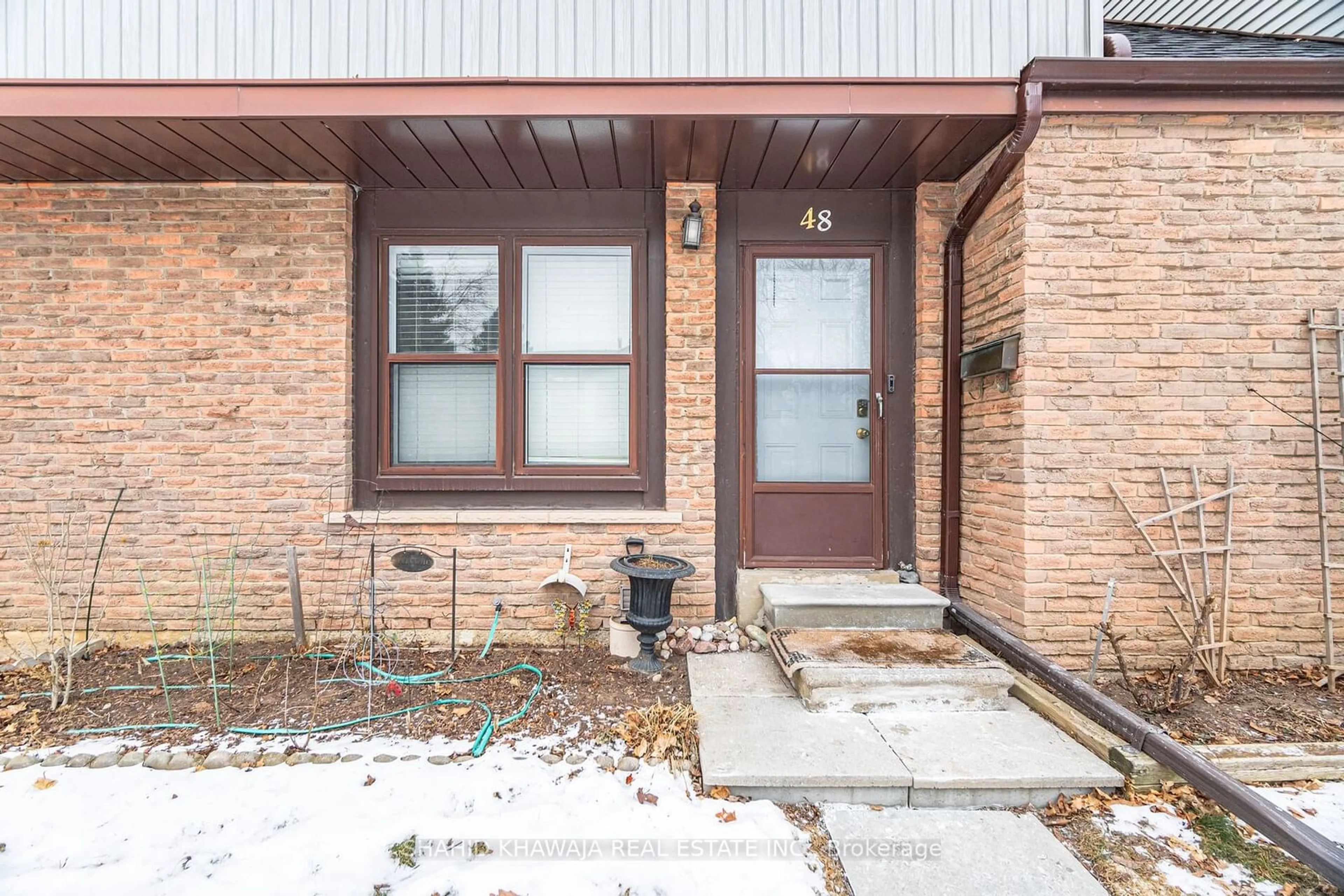 Home with brick exterior material, street for 6730 Falconer Dr #48, Mississauga Ontario L5N 1L5