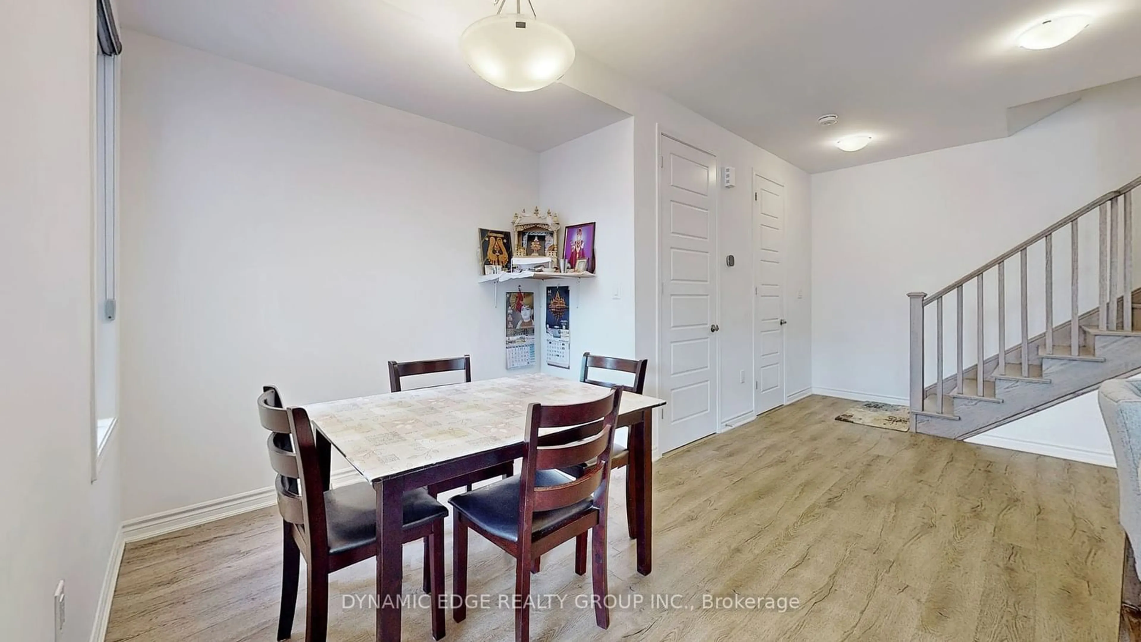 Dining room, wood/laminate floor for 61 Keppel Circ, Brampton Ontario L7A 0B6