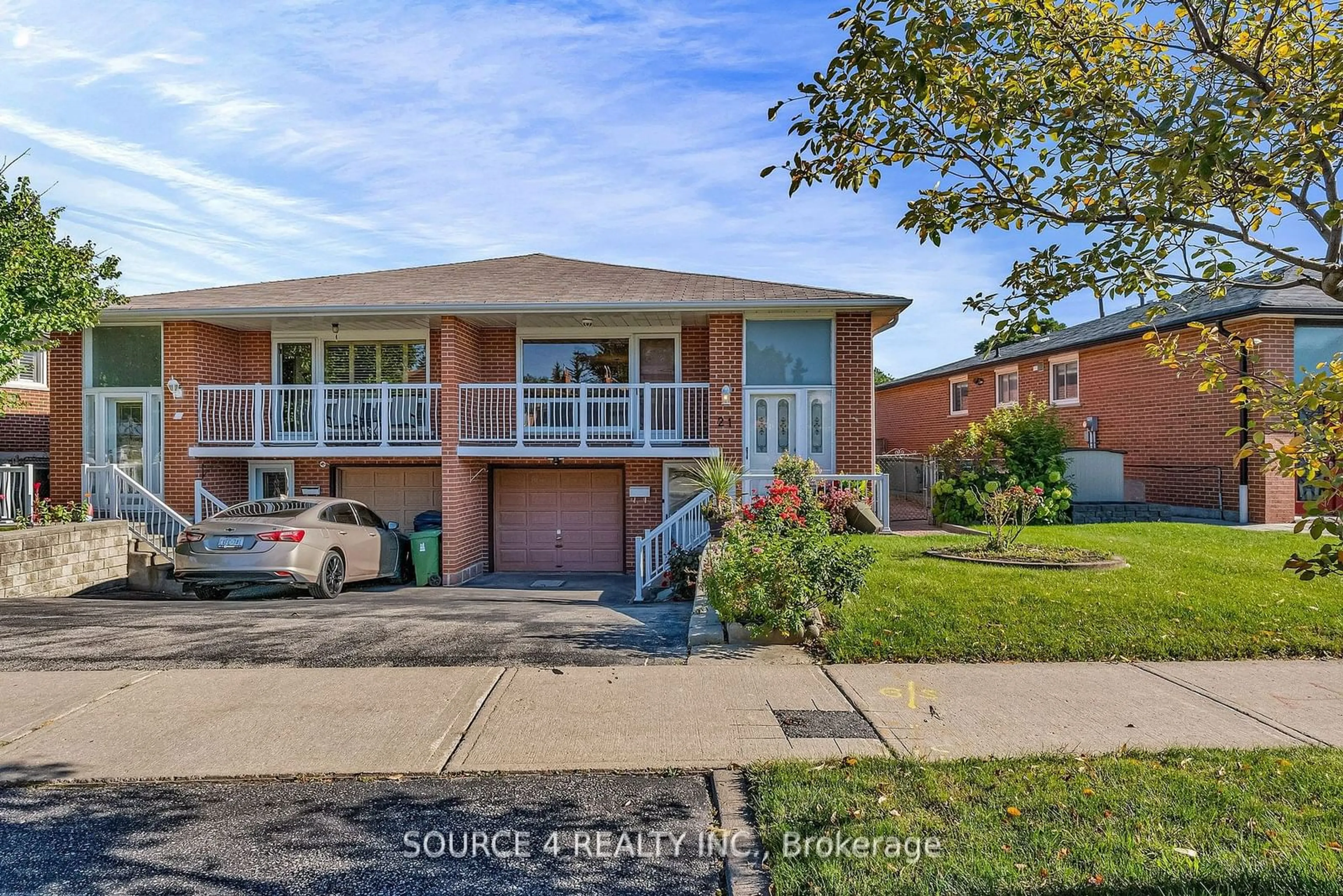 Home with brick exterior material, street for 21 Madonna Gdns, Toronto Ontario M9L 2T5