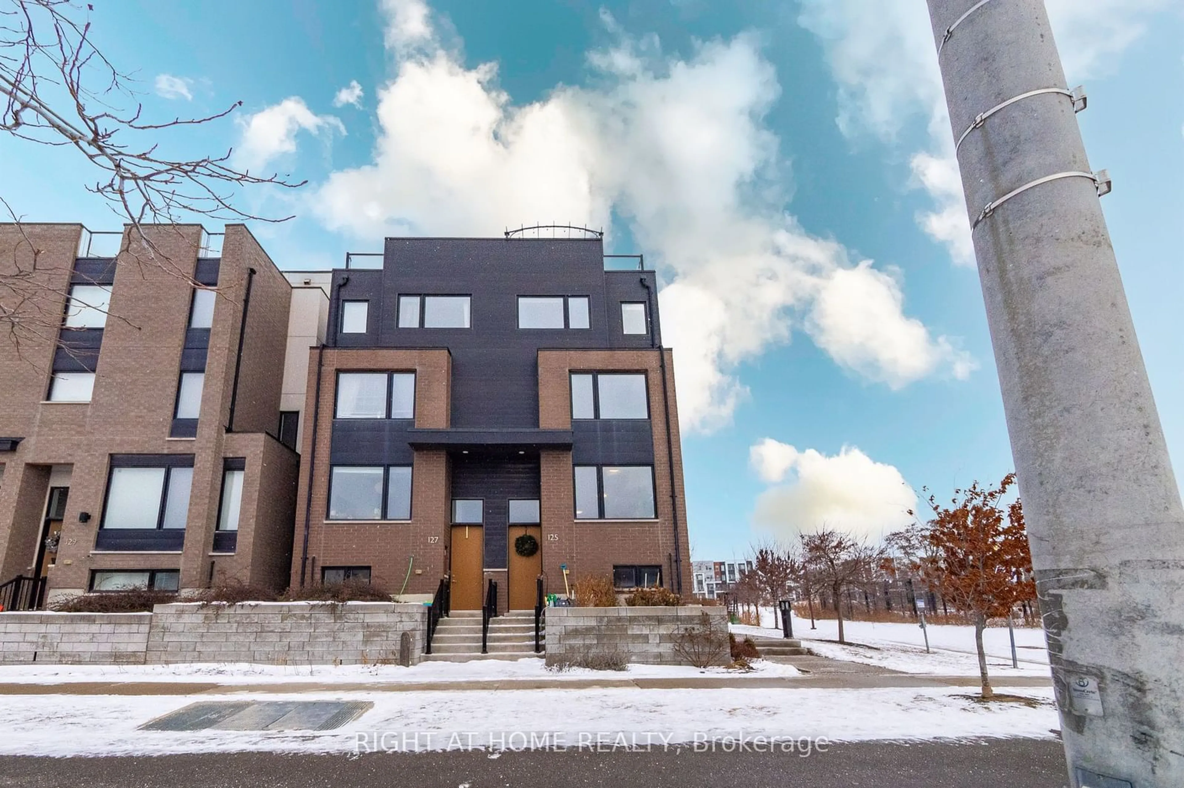 Home with brick exterior material, street for 125 Stanley Greene Blvd, Toronto Ontario M3K 0A7