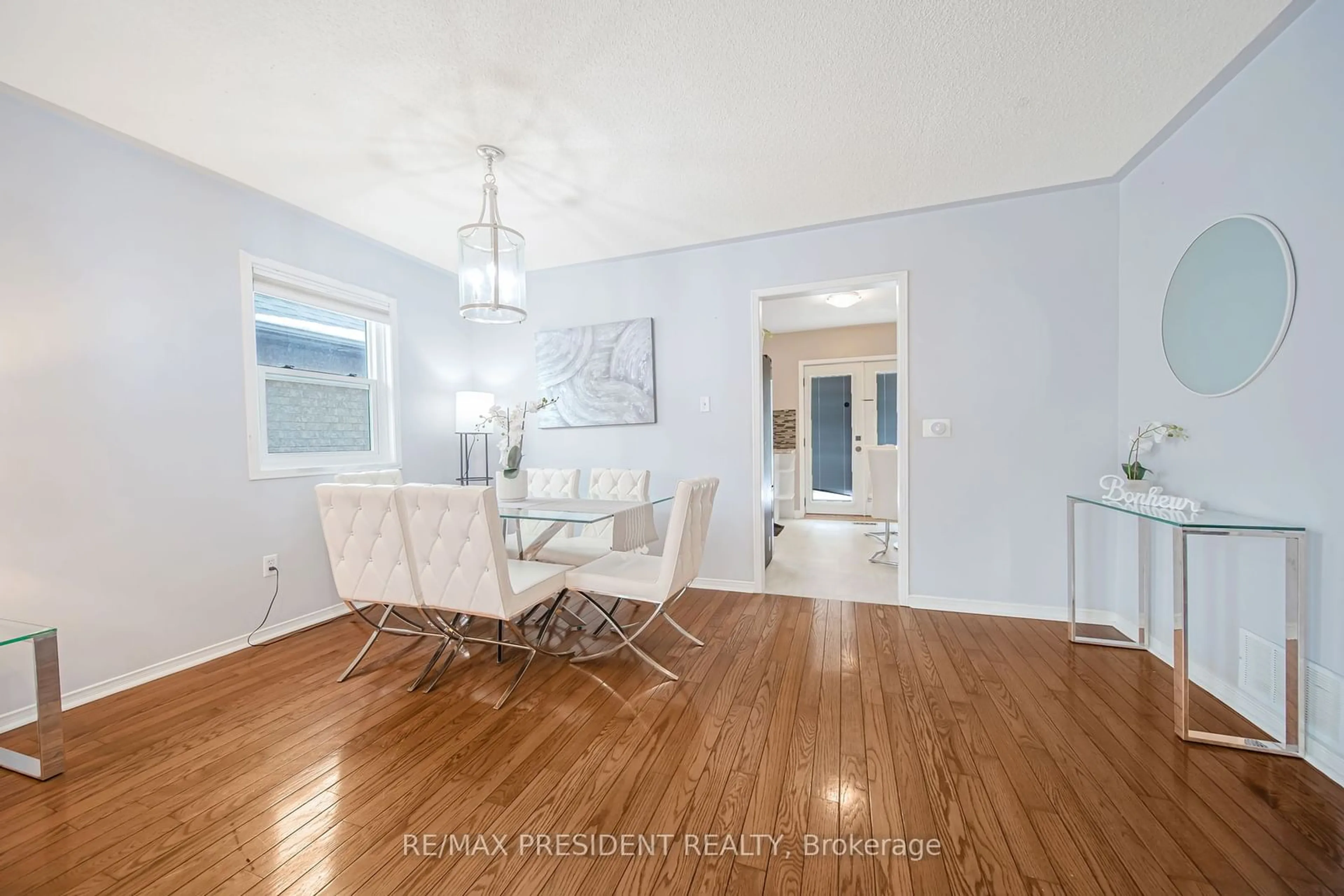 Dining room, wood/laminate floor for 85 Springview Dr, Brampton Ontario L6X 4L1