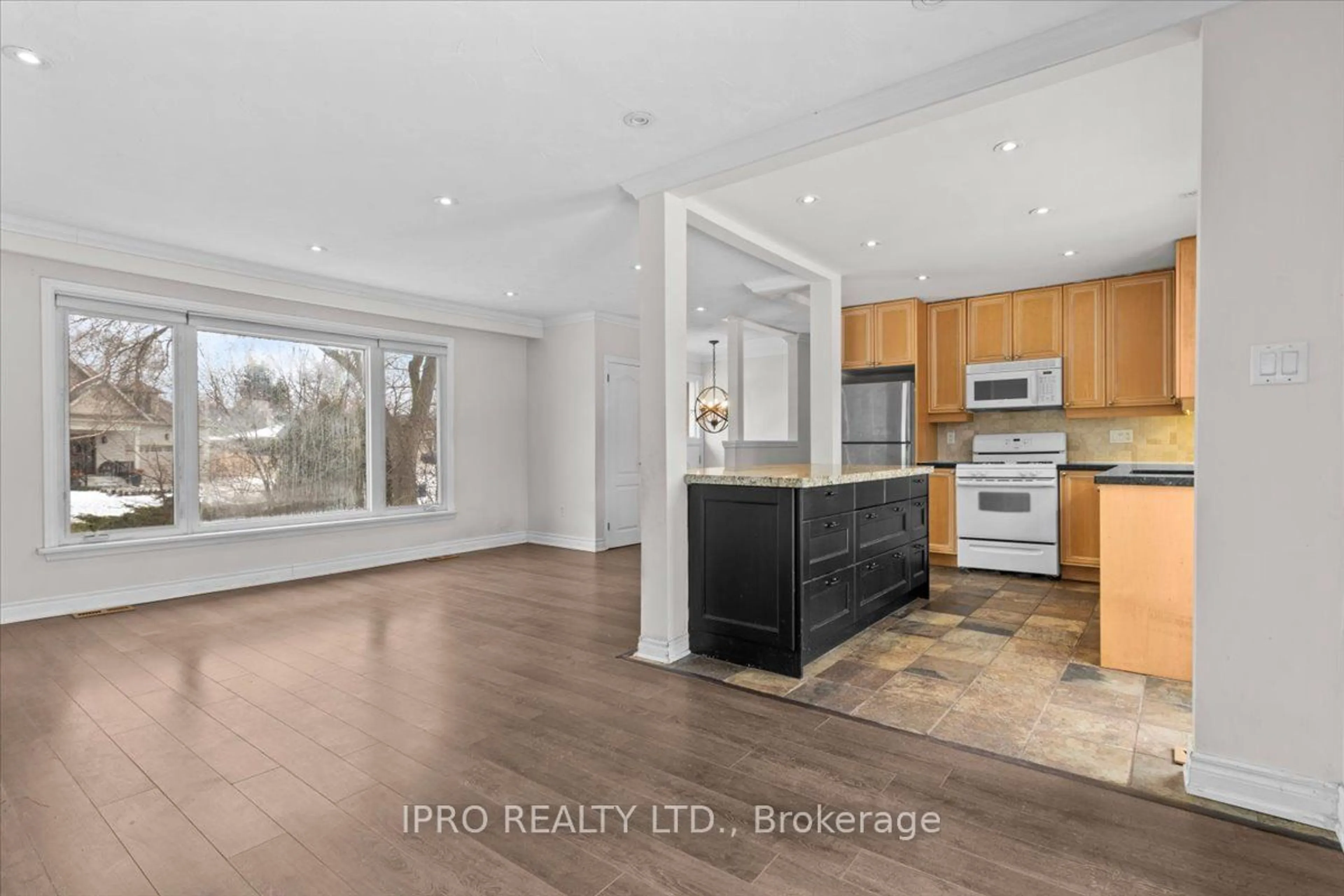 Open concept kitchen, wood/laminate floor for 1333 Sheldon Ave, Oakville Ontario L6L 2P9