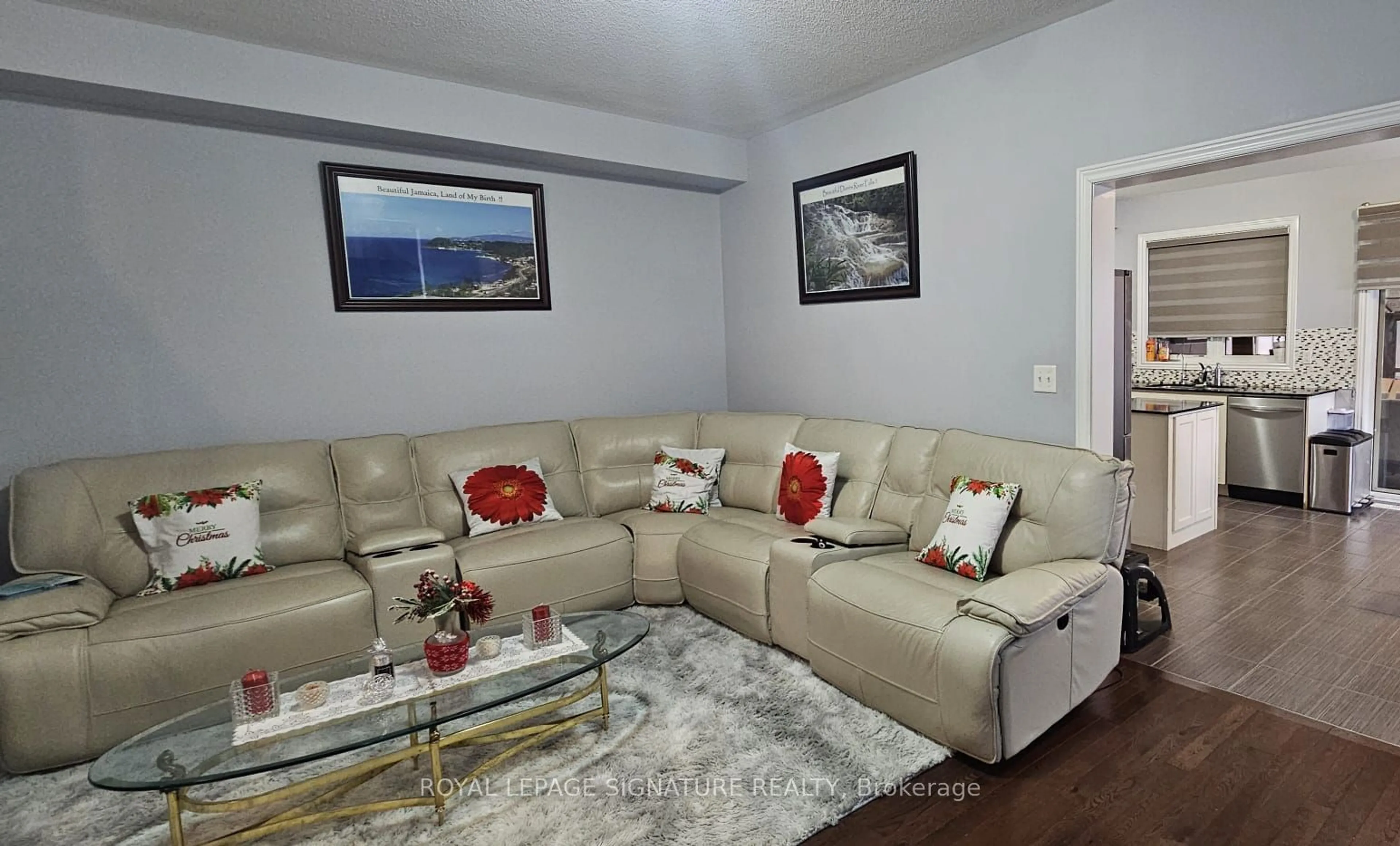 Living room with furniture, wood/laminate floor for 1 Fresnel Rd, Brampton Ontario L7A 4Z2