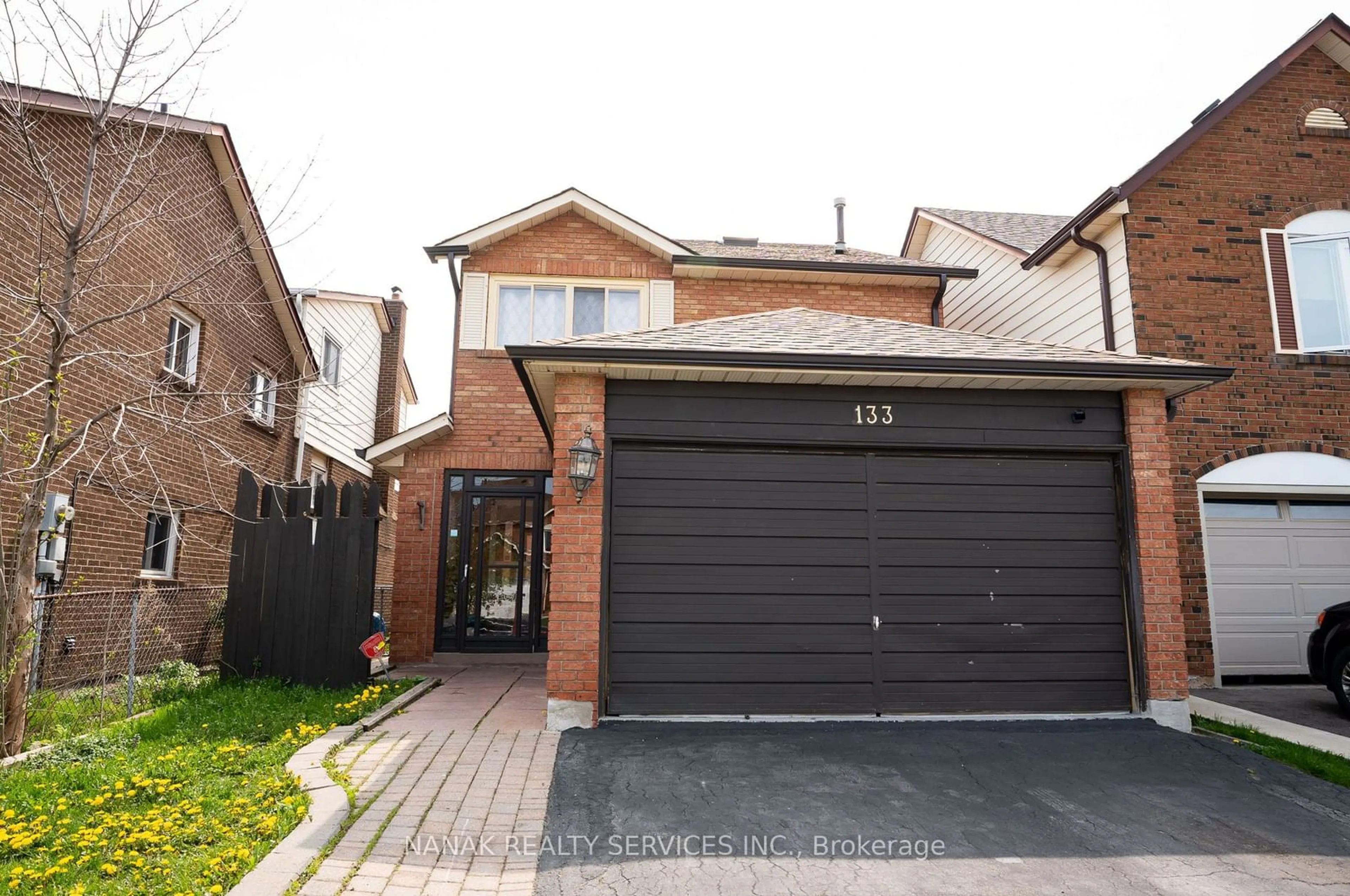 Home with brick exterior material, street for 133 Murray St St, Brampton Ontario L6X 2S5