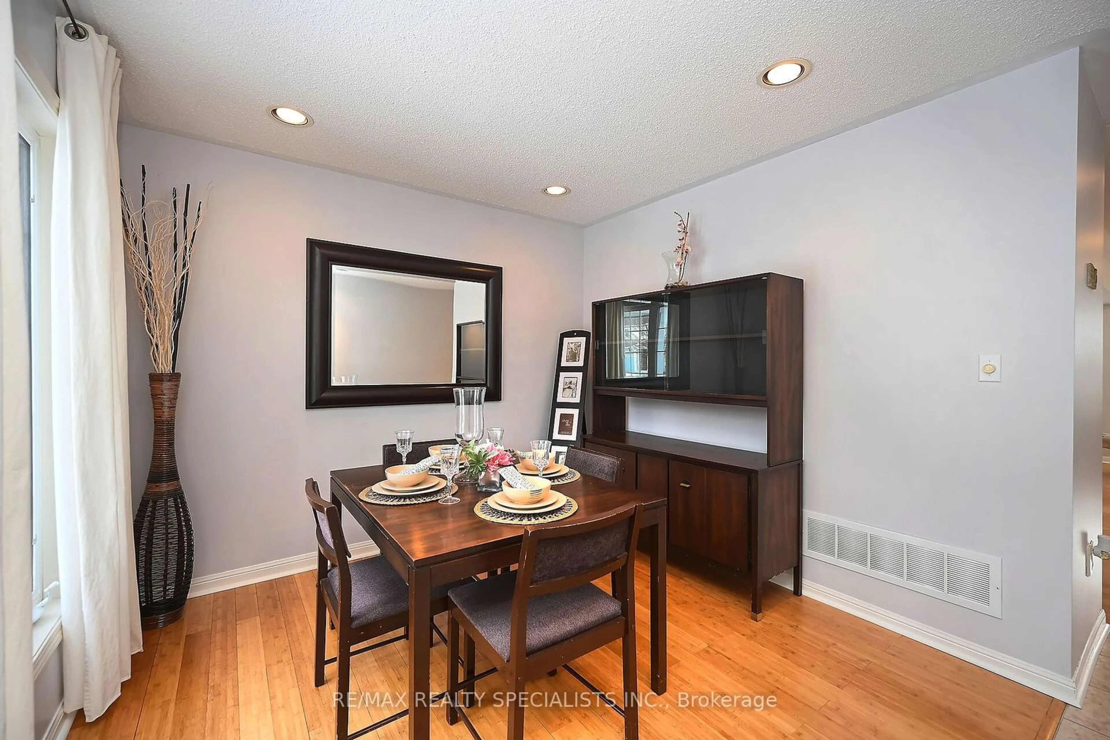 Dining room, wood/laminate floor for 67 Jessop Dr, Brampton Ontario L7A 3N4