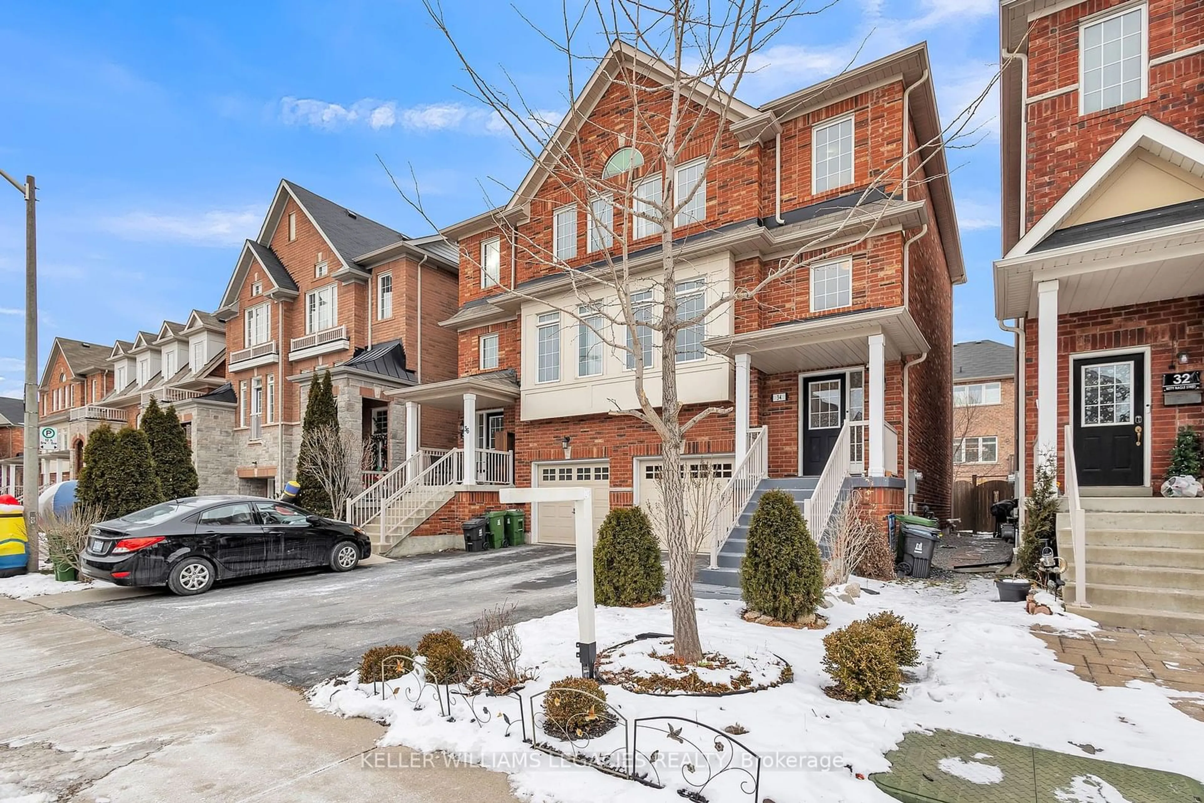 Home with brick exterior material, street for 34 Betty Nagle St, Toronto Ontario M9M 0E2