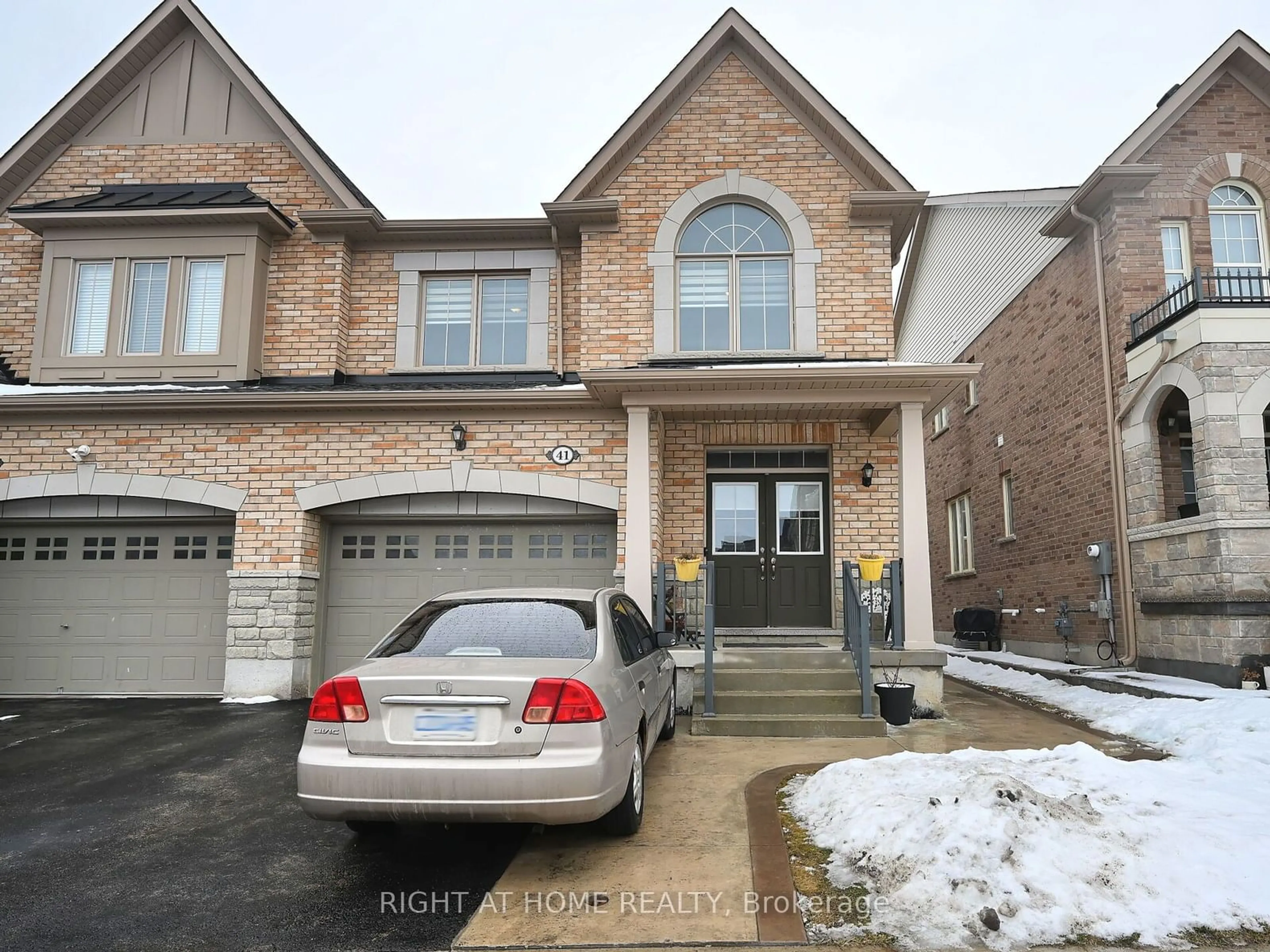 Home with brick exterior material, street for 41 Merrybrook Tr, Brampton Ontario L7A 4V9