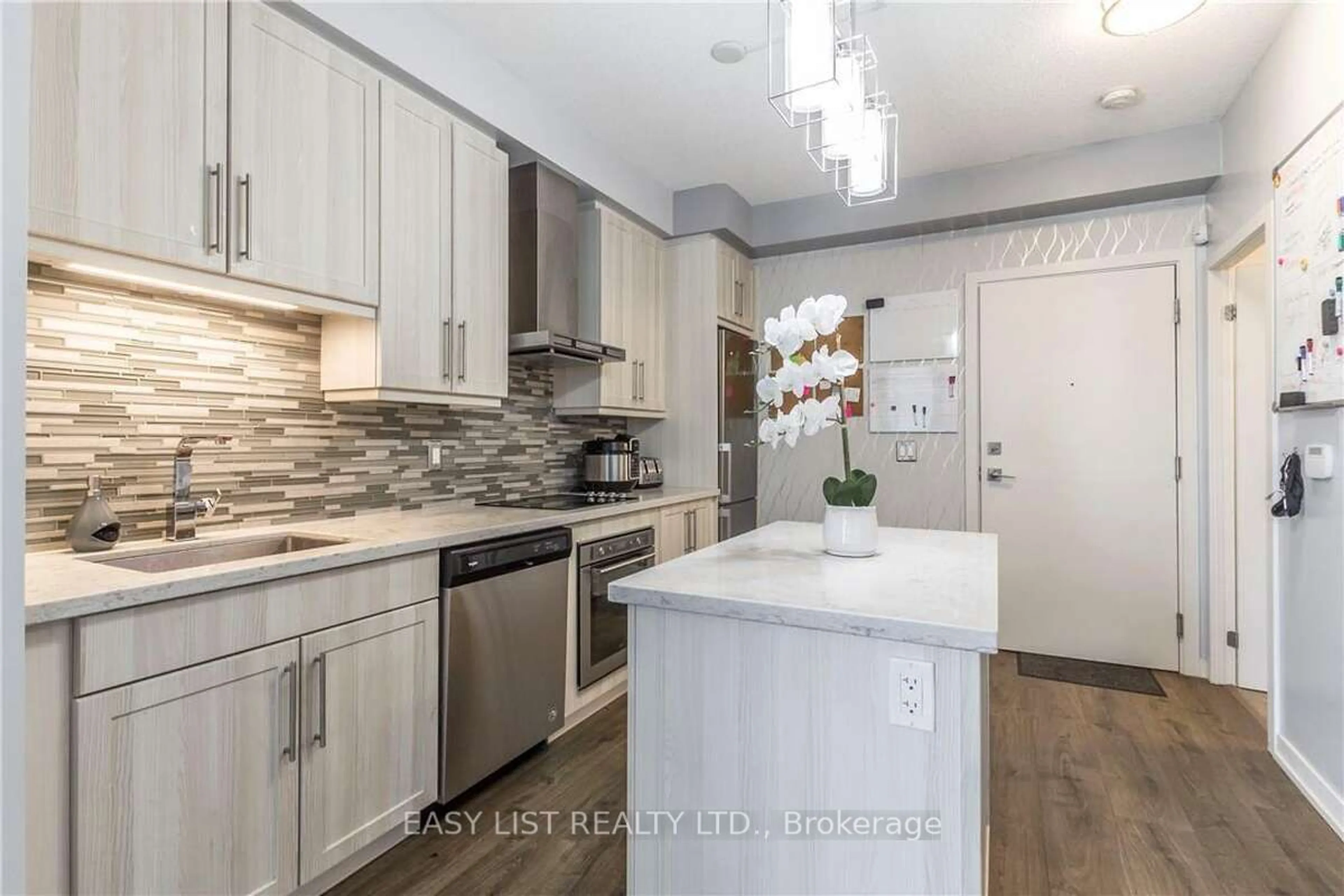 Open concept kitchen, unknown for 2087 Fairview St #1001, Burlington Ontario L7R 0E5