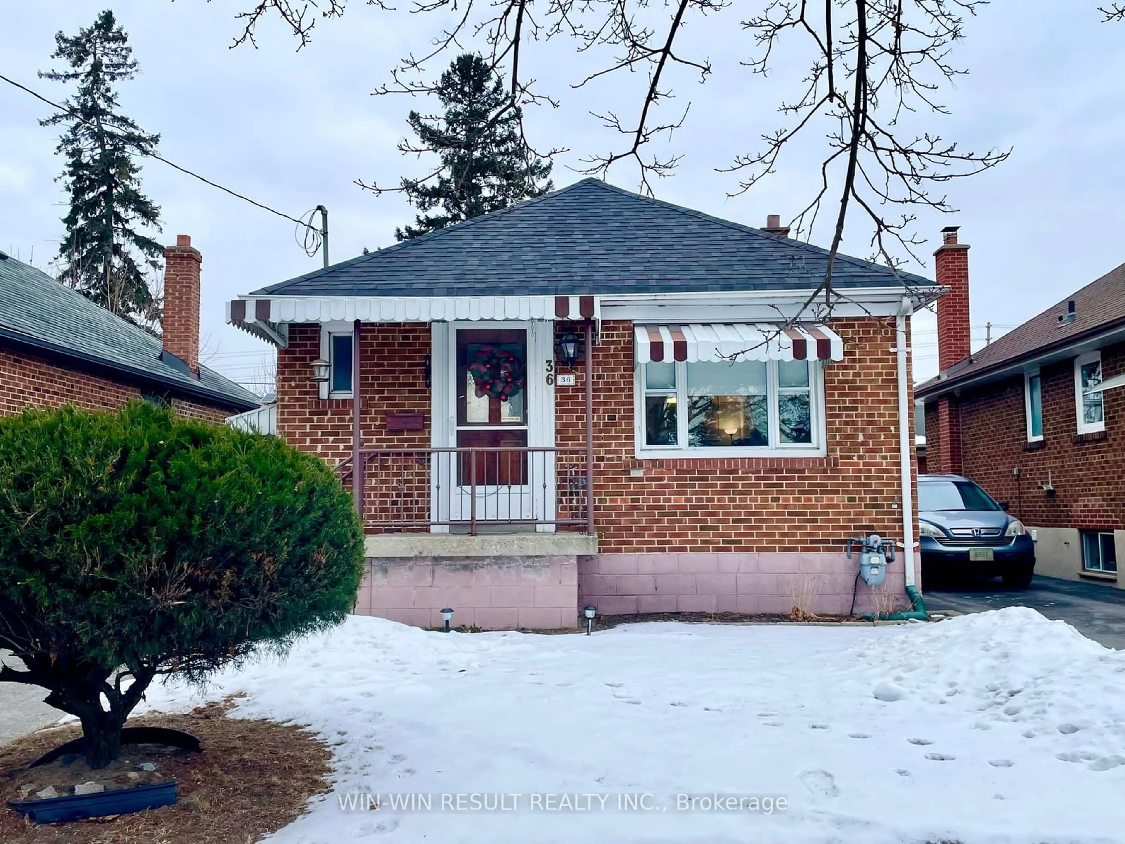 Home with brick exterior material, street for 36 Rothsay Ave, Toronto Ontario M8Z 4M3