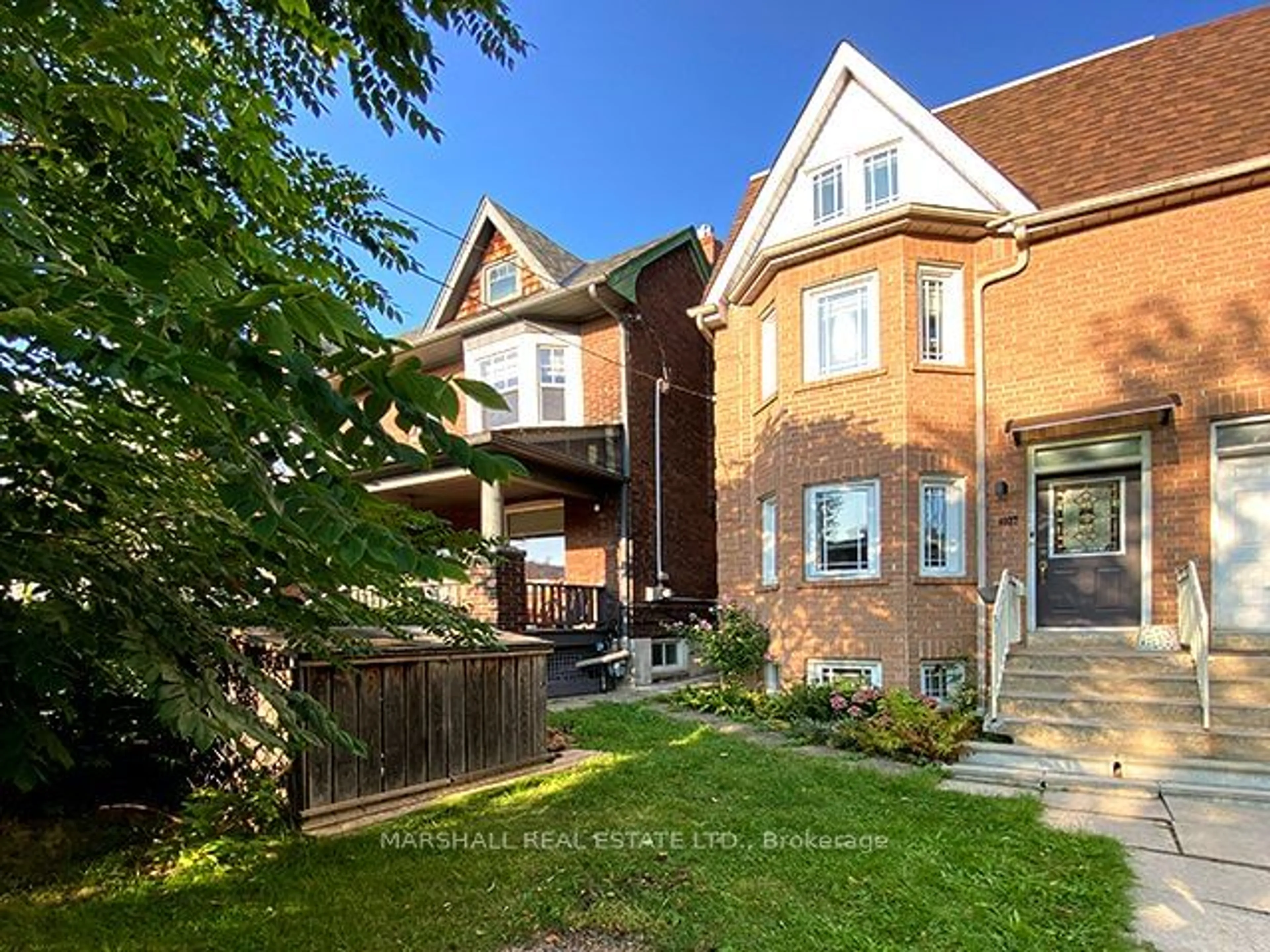 Home with brick exterior material, street for 1027 St Clarens Ave, Toronto Ontario M6H 3X8