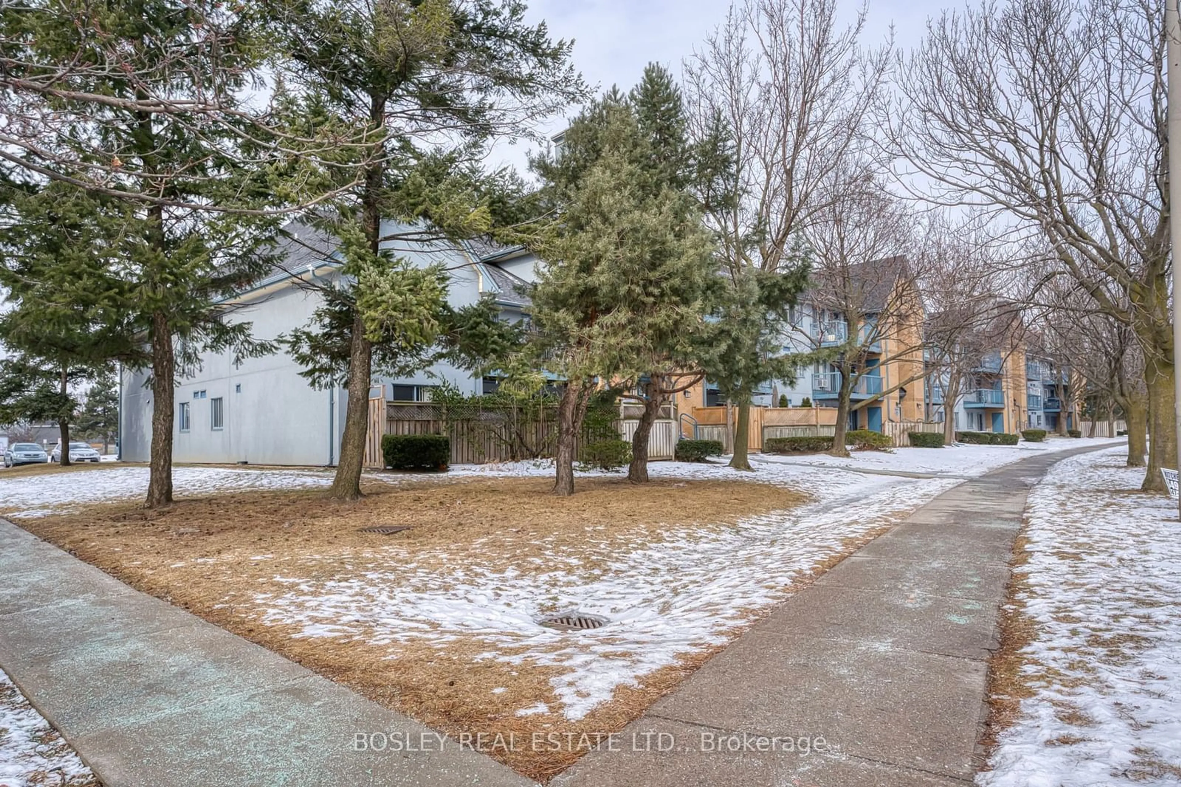 A pic from outside/outdoor area/front of a property/back of a property/a pic from drone, street for 65 Trailwood Dr #311, Mississauga Ontario L4Z 3L1