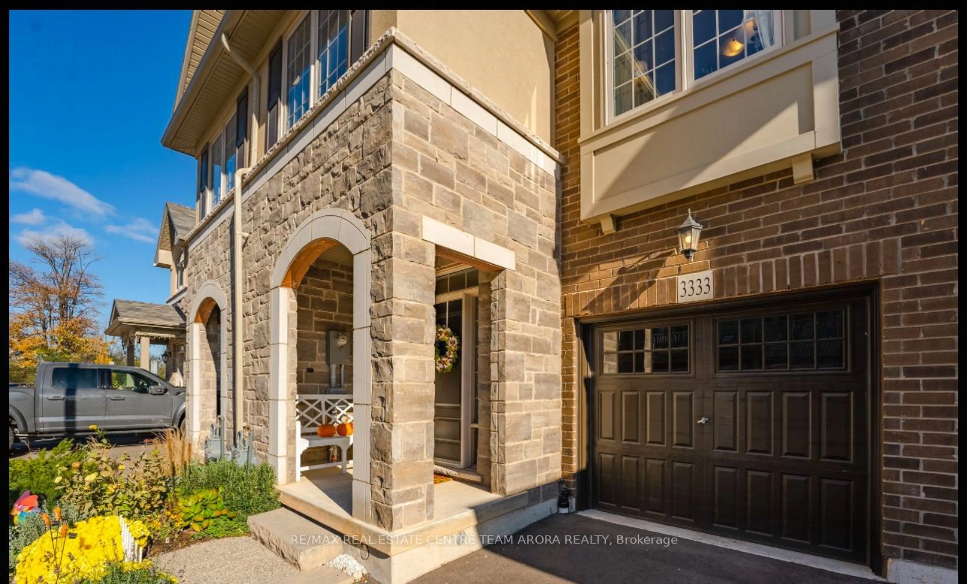 Home with brick exterior material, street for 3333 Mockingbird Common Cres, Oakville Ontario L6H 0X1