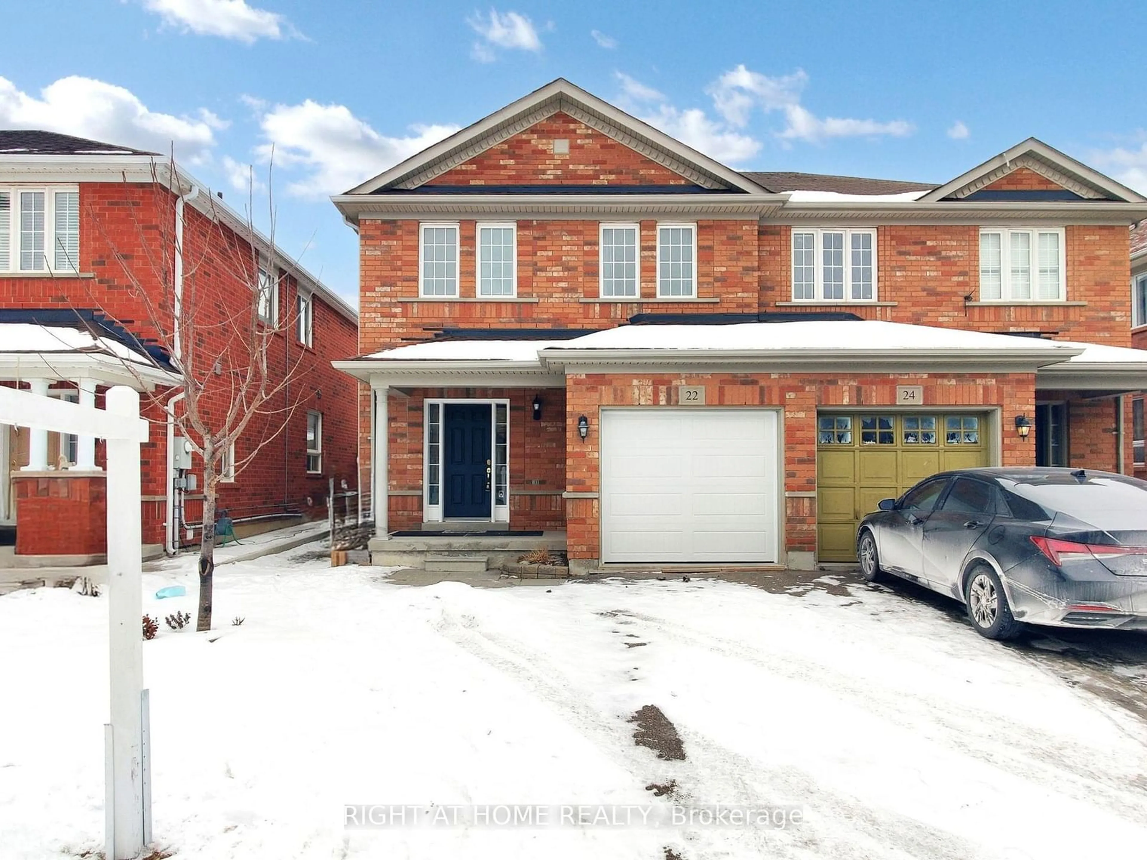 Home with brick exterior material, street for 22 Hollingsworth Circ, Brampton Ontario L7A 0J7