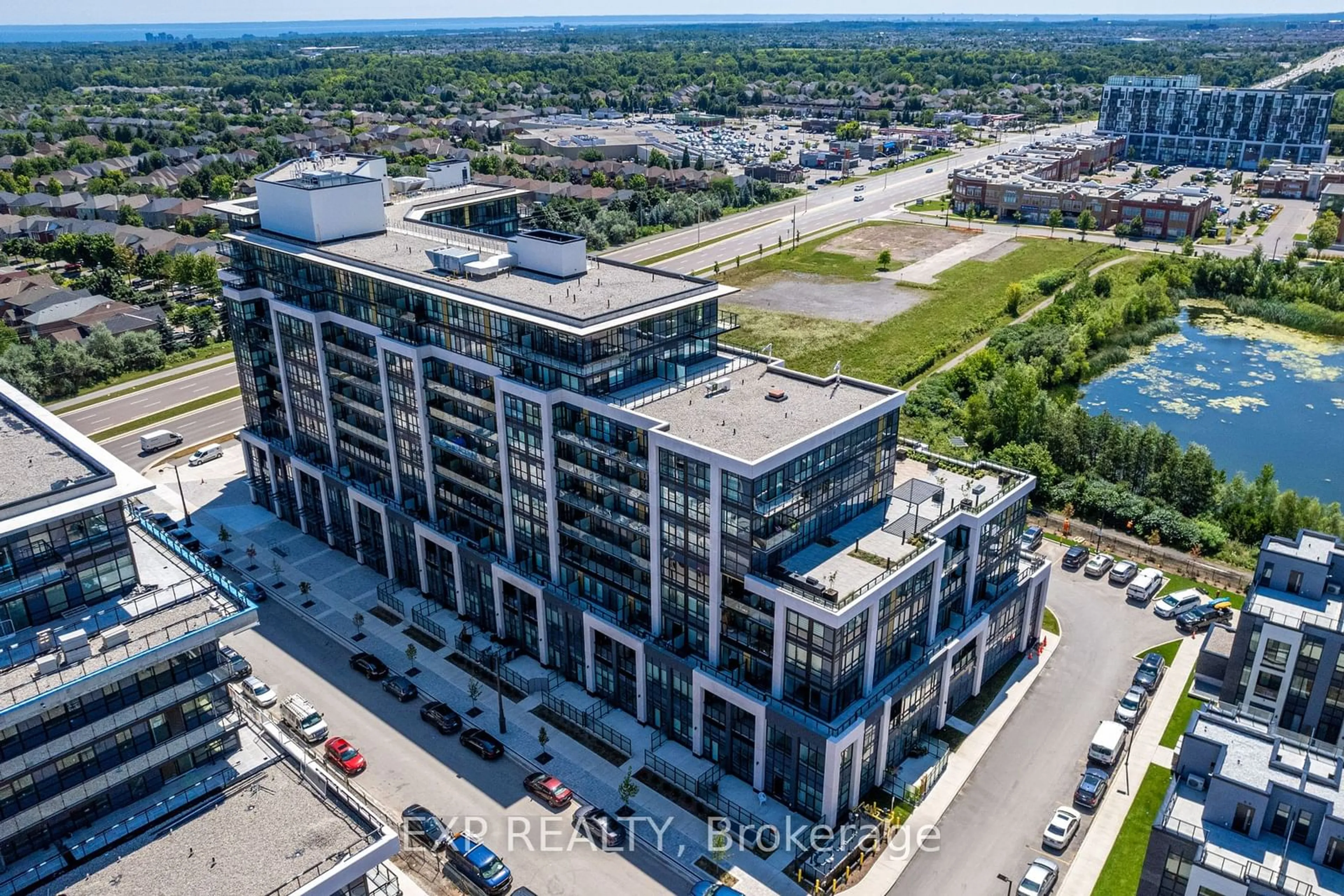 A pic from outside/outdoor area/front of a property/back of a property/a pic from drone, building for 405 Dundas St #307, Oakville Ontario L6M 5P9