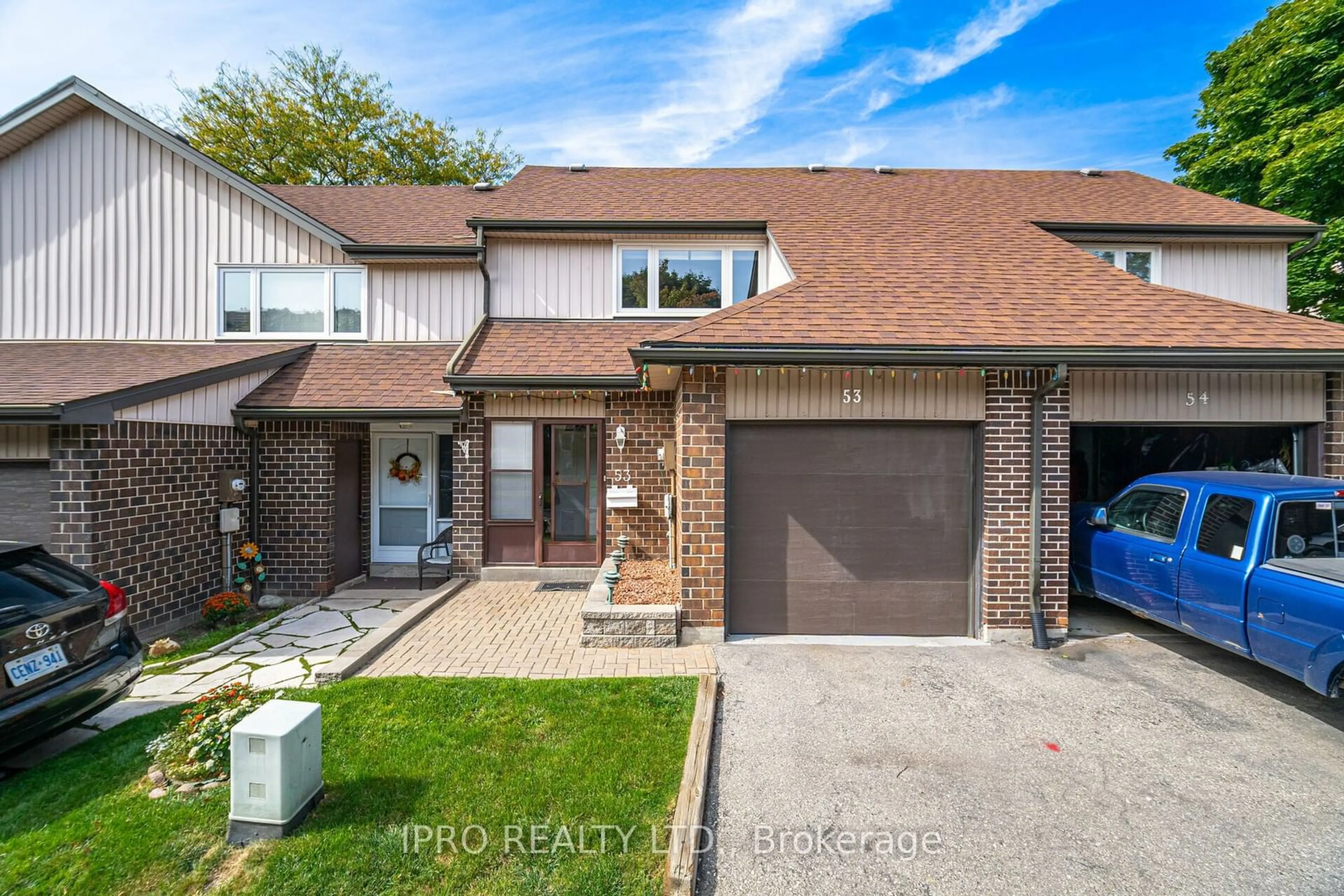 Home with brick exterior material, street for 318 Laurier Ave #53, Milton Ontario L9T 3M9