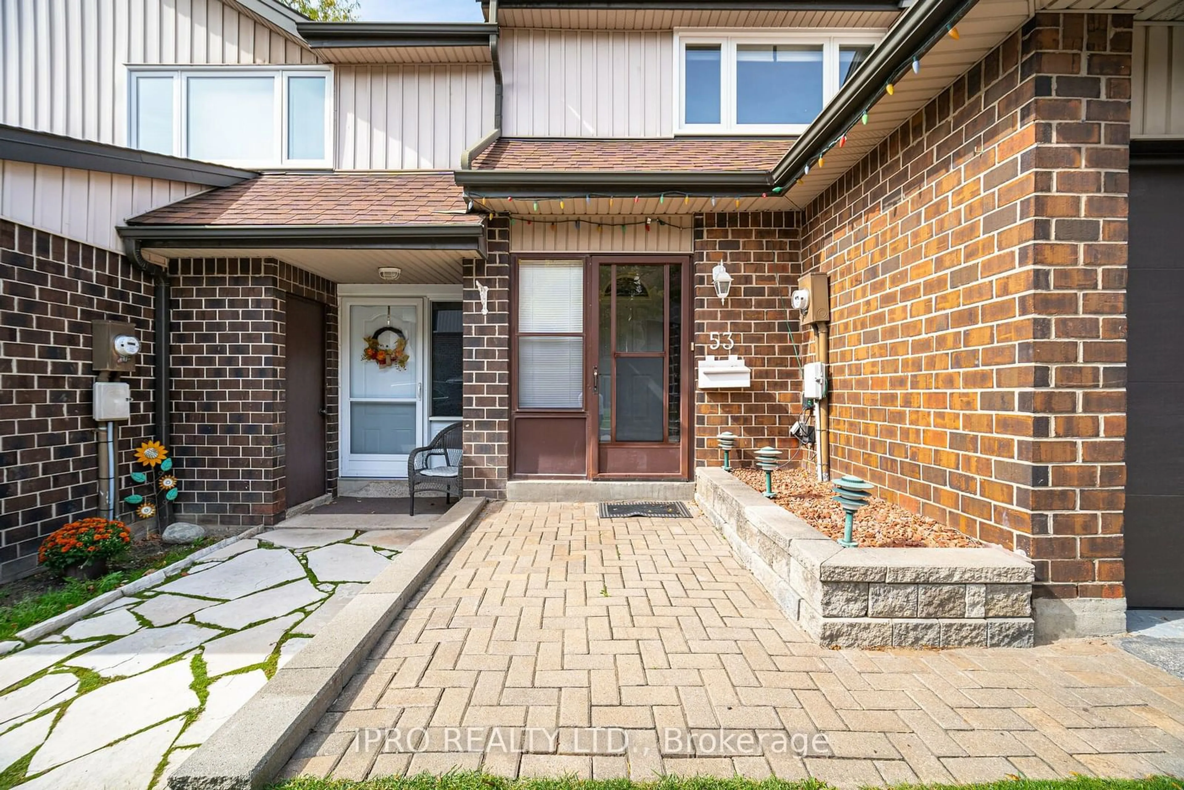 Home with brick exterior material, street for 318 Laurier Ave #53, Milton Ontario L9T 3M9