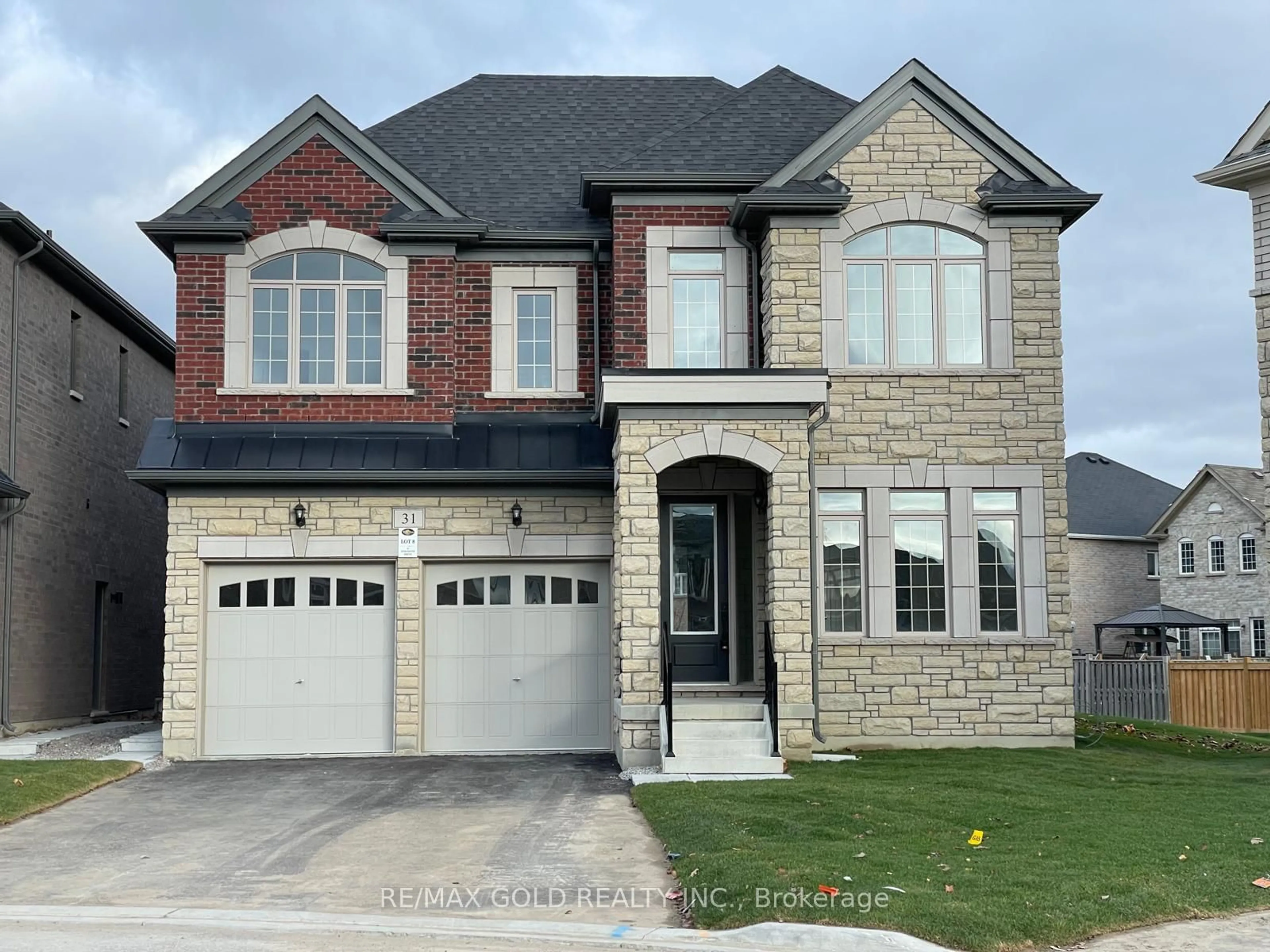 Home with brick exterior material, street for 31 Dolomite Dr, Brampton Ontario L6P 4R6