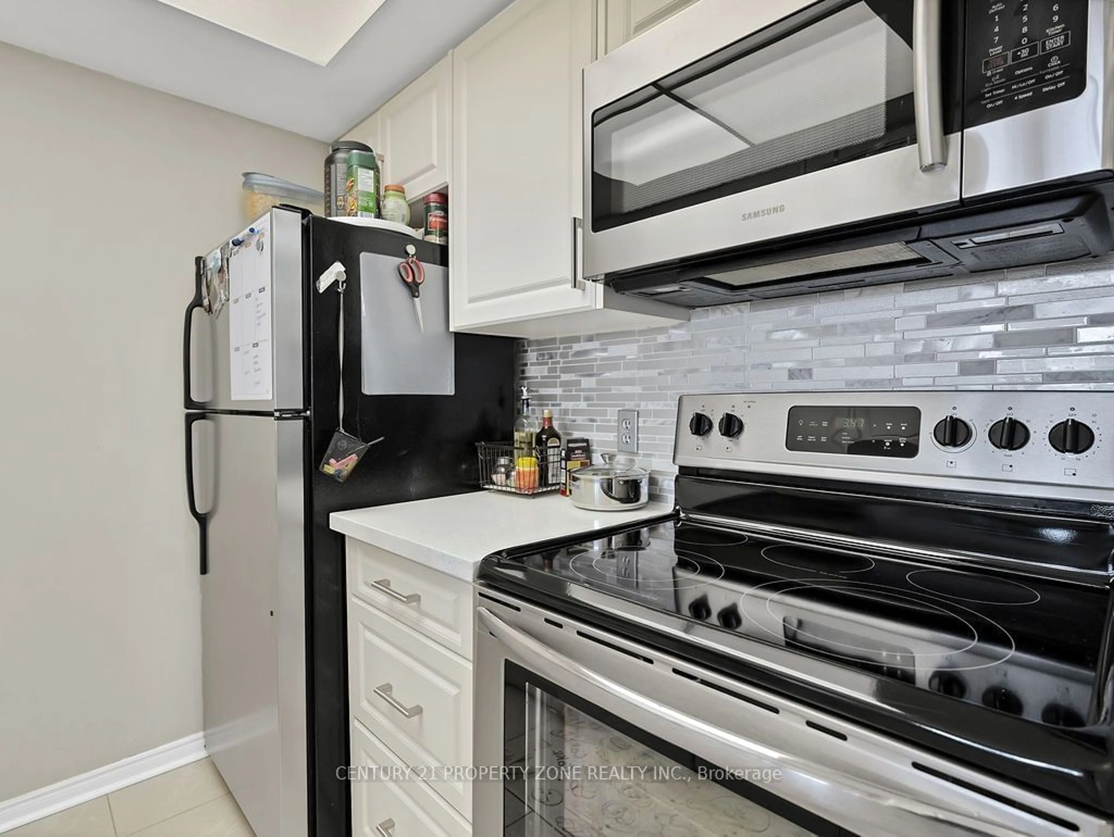 Standard kitchen, ceramic/tile floor for 8351 McLaughlin Rd #403, Brampton Ontario L6Y 4H8