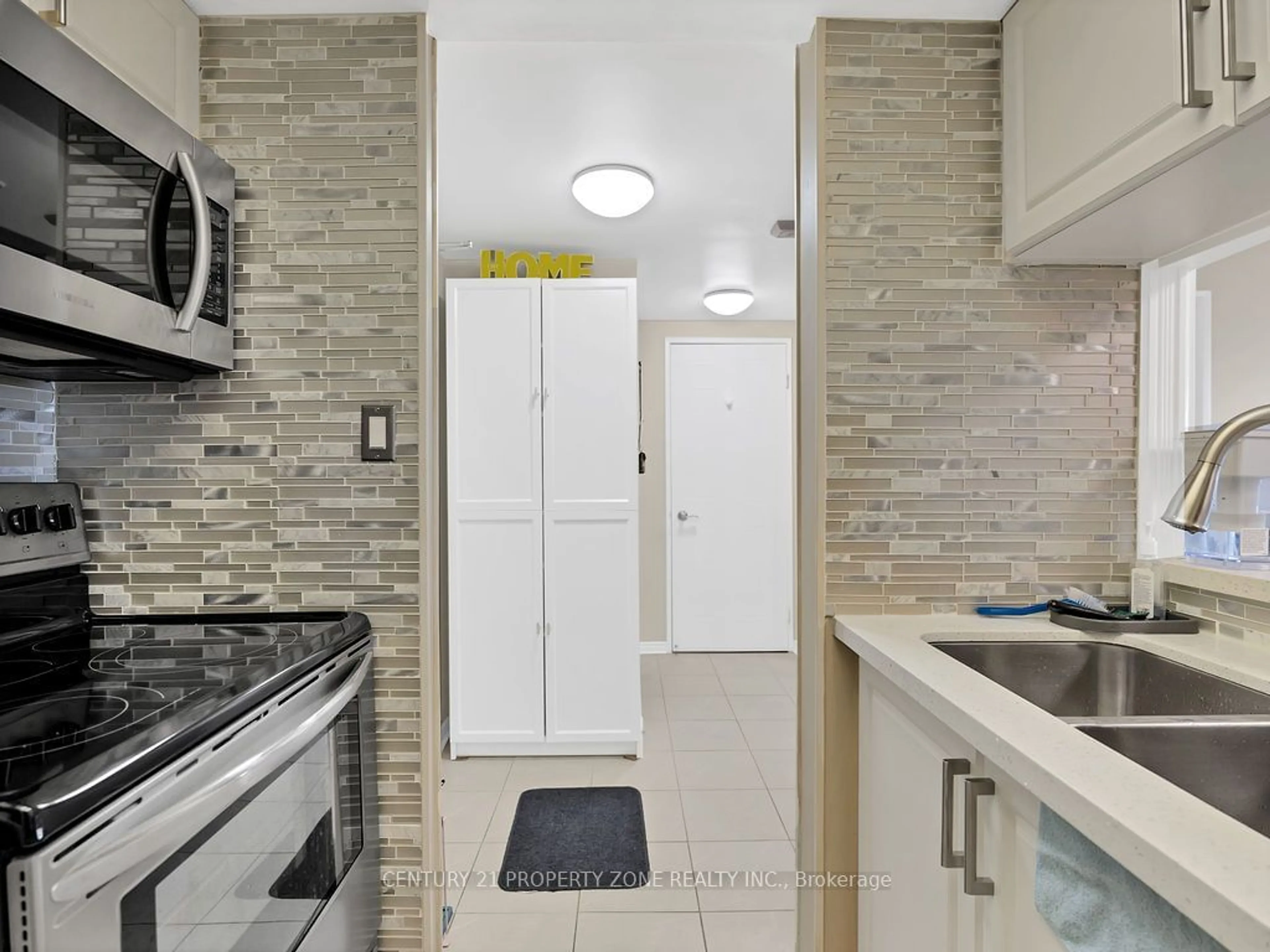 Standard kitchen, ceramic/tile floor for 8351 McLaughlin Rd #403, Brampton Ontario L6Y 4H8