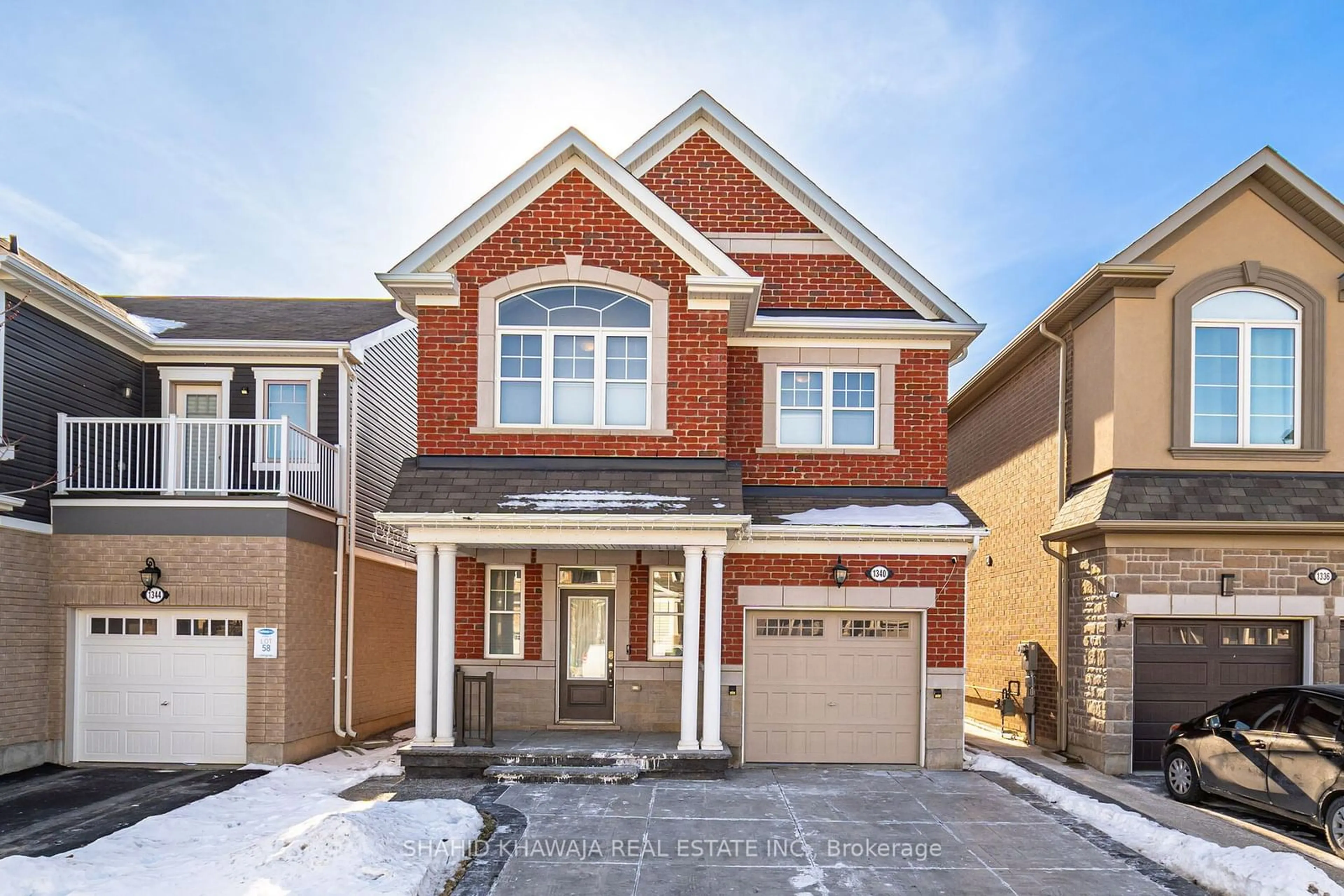 Home with brick exterior material, street for 1340 Rose Way, Milton Ontario L9T 7E7