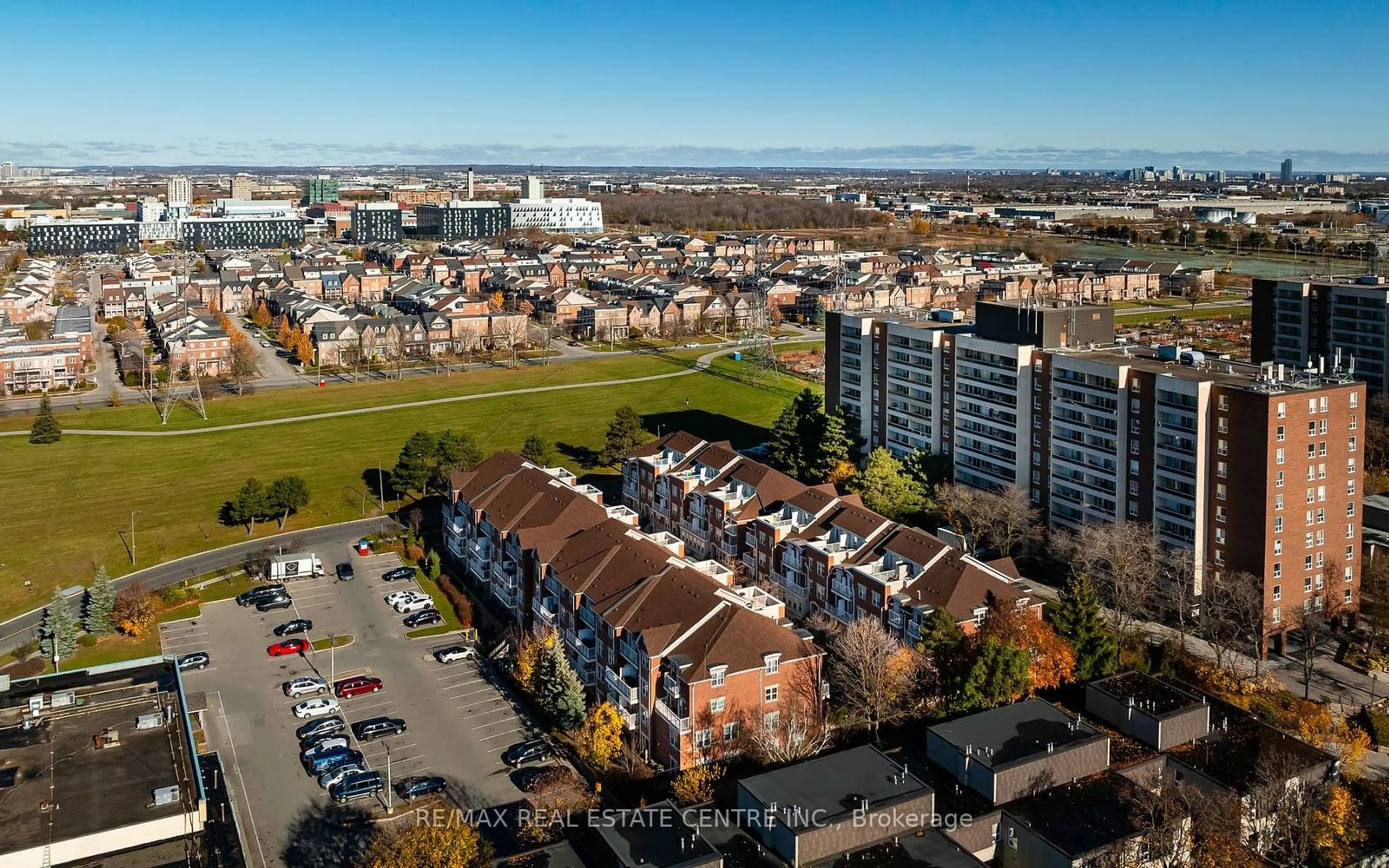 A pic from outside/outdoor area/front of a property/back of a property/a pic from drone, city buildings view from balcony for 37 Four Winds Dr #108, Toronto Ontario M3J 1K7