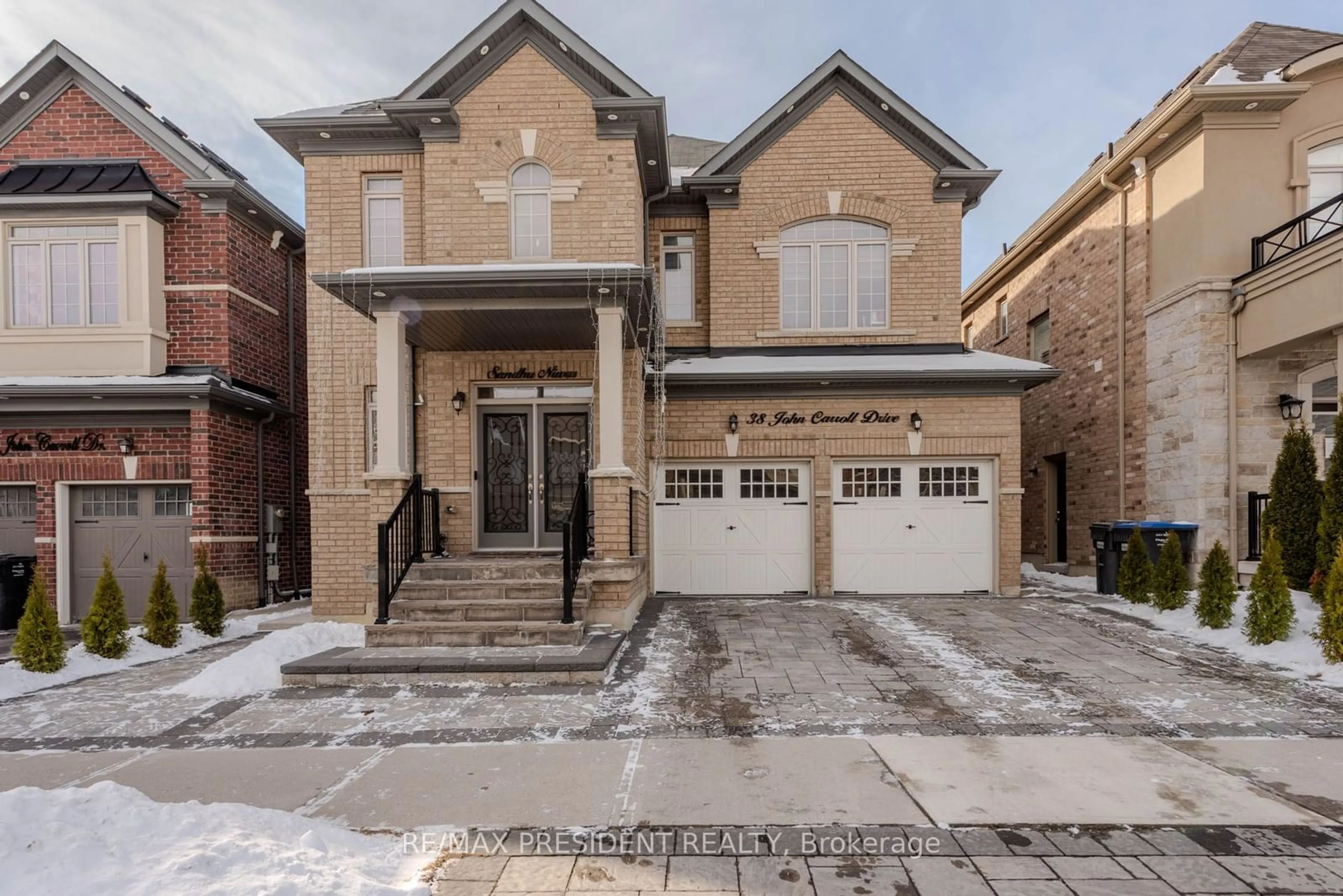 Home with brick exterior material, street for 38 John Carroll Dr, Brampton Ontario L6P 4J8