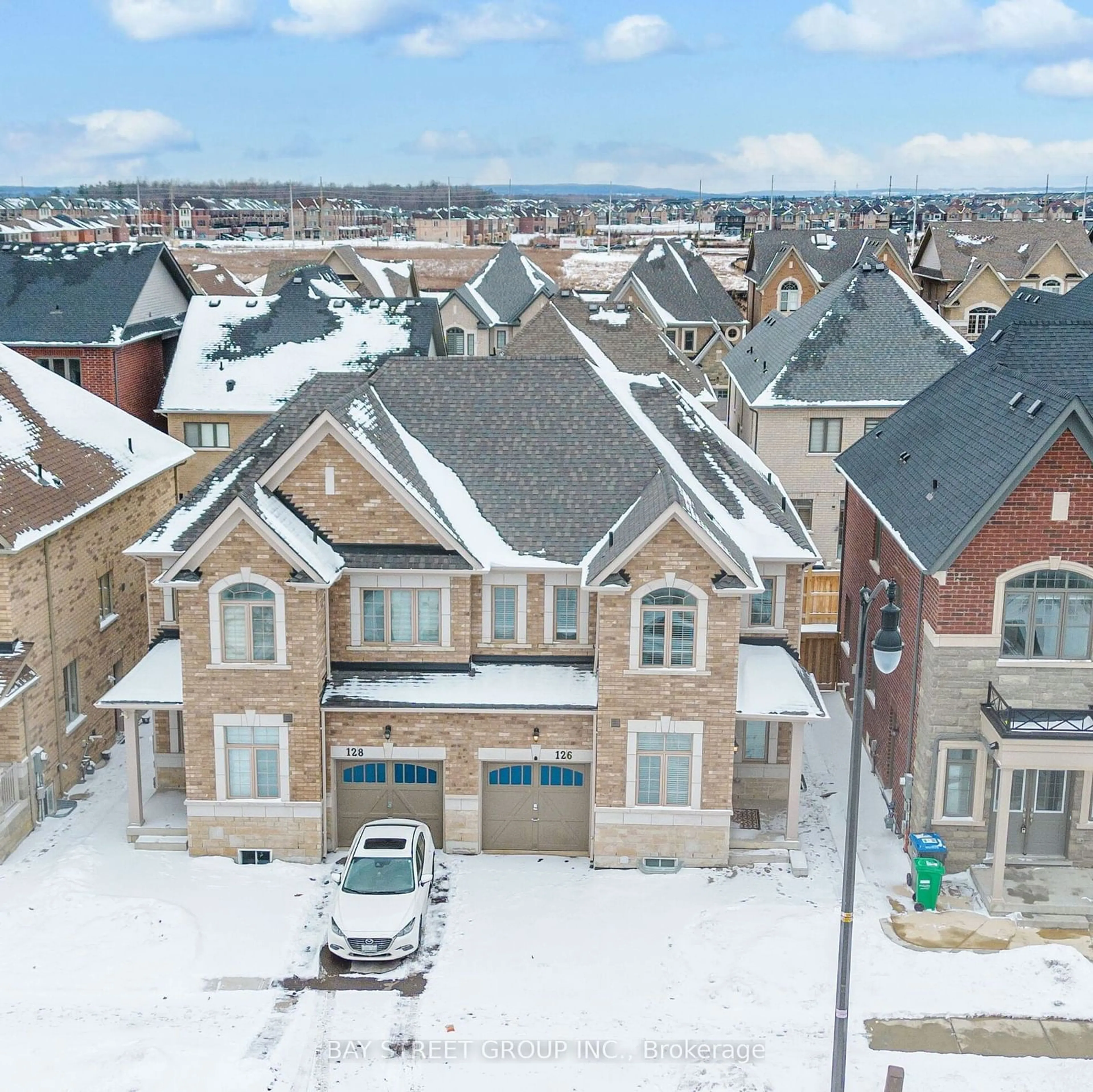 A pic from outside/outdoor area/front of a property/back of a property/a pic from drone, street for 126 Dolobram Tr, Brampton Ontario L7A 4Y5