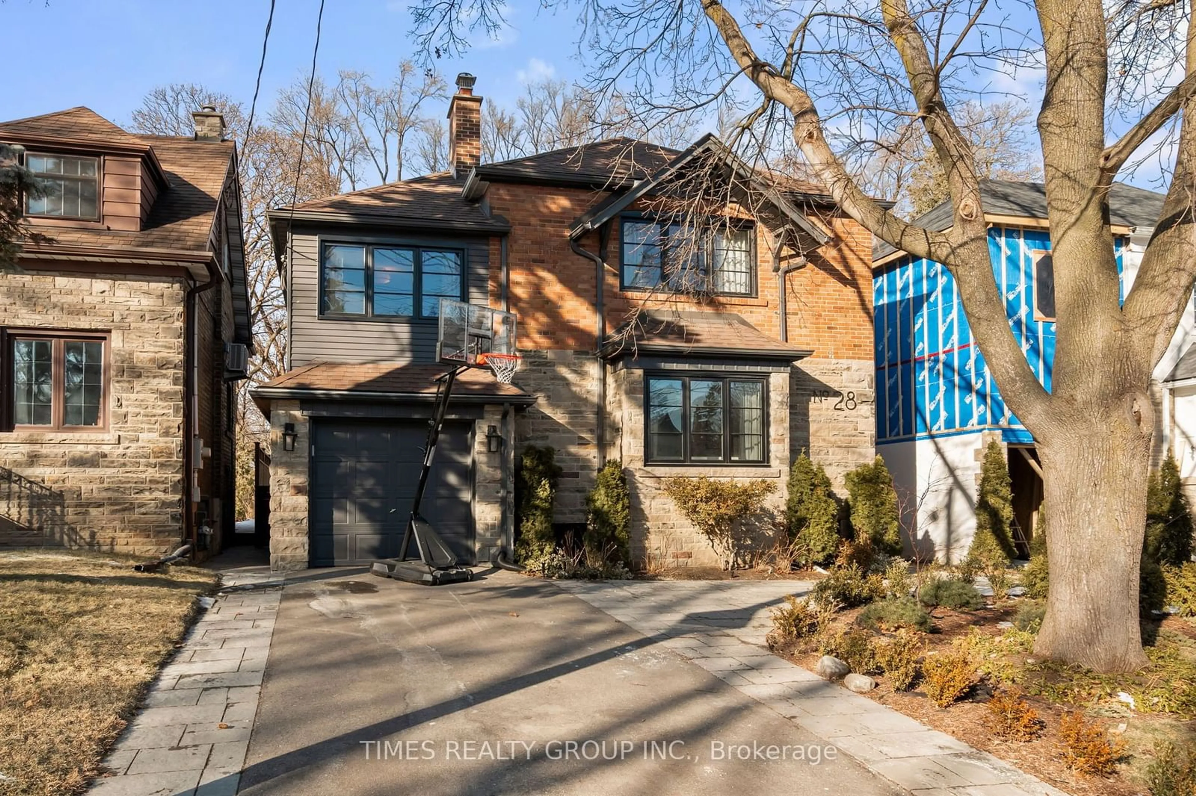 Home with brick exterior material, street for 28 Glenaden Ave, Toronto Ontario M8Y 2L3