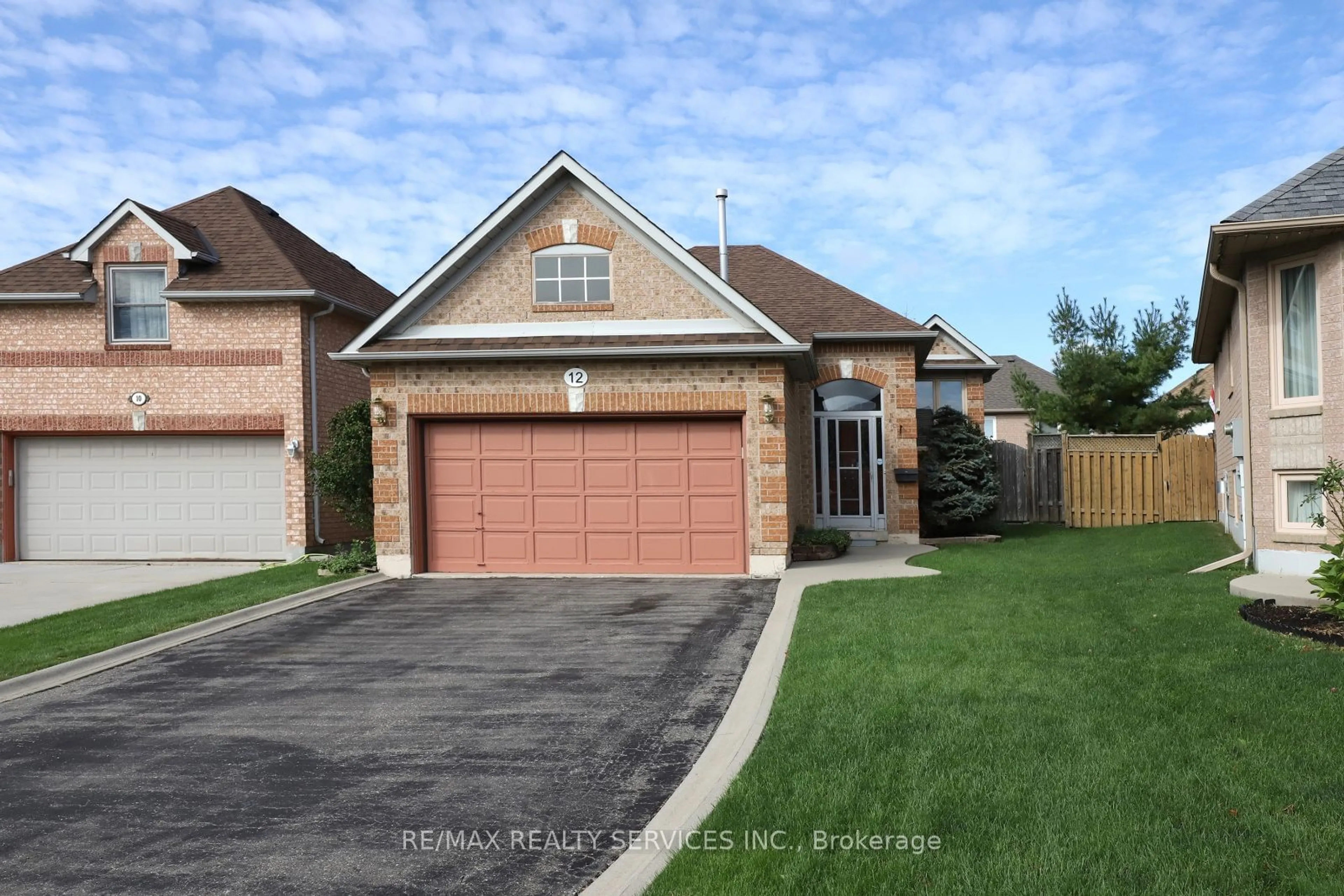 Home with brick exterior material, street for 12 Summerfield Cres, Brampton Ontario L6X 4L3