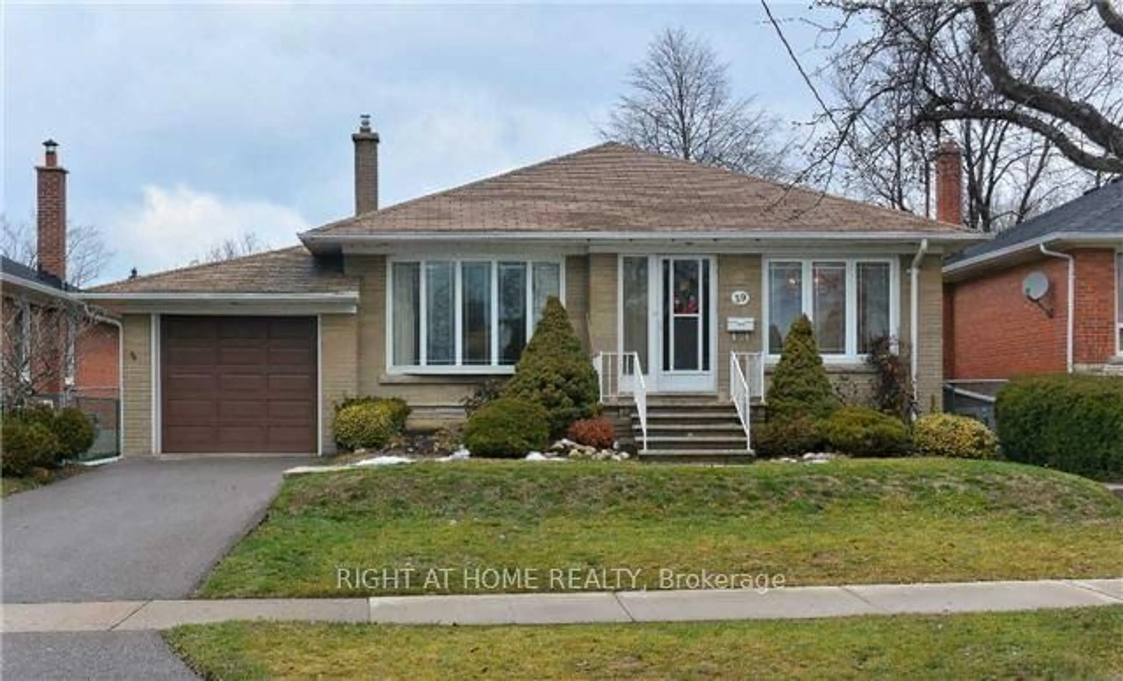 Home with brick exterior material, street for 39 Bridgetown Dr, Toronto Ontario M9C 2P5