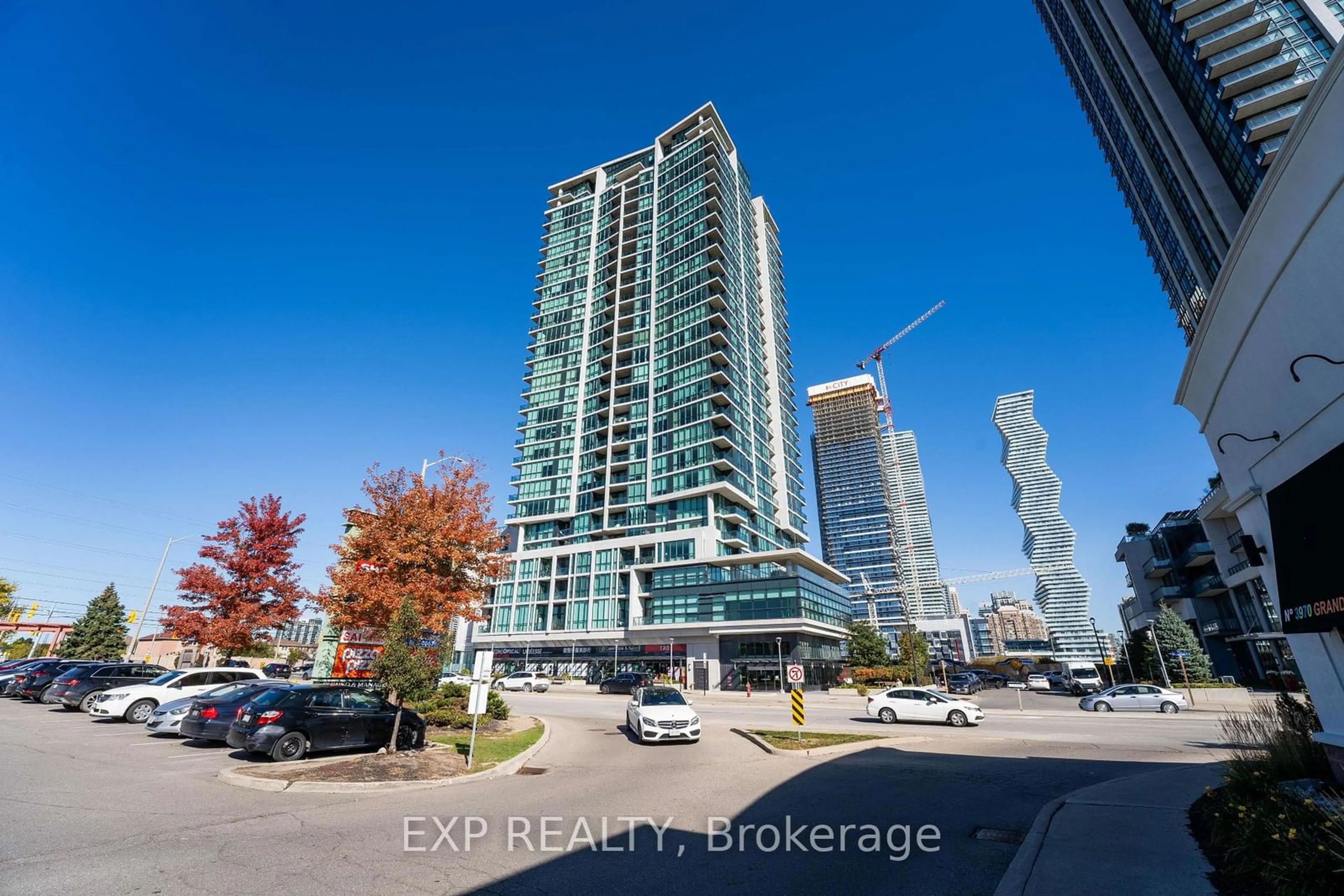 A pic from outside/outdoor area/front of a property/back of a property/a pic from drone, unknown for 3985 Grand Park Dr #406, Mississauga Ontario L5B 0H8