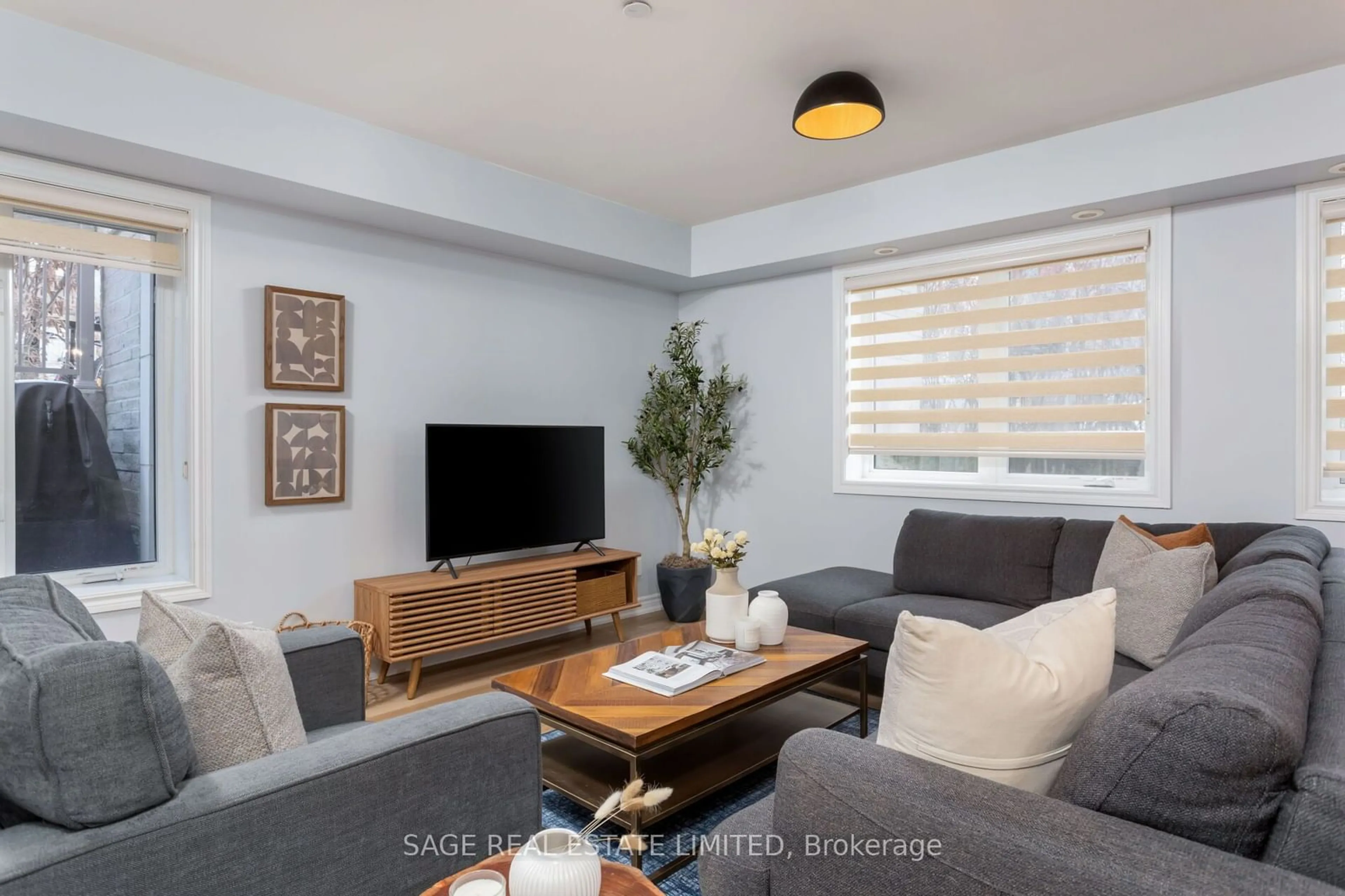 Living room with furniture, wood/laminate floor for 120 Long Branch Ave #16, Toronto Ontario M8W 1N6